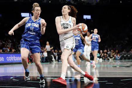 Breanna Stewart (30) of the New York Liberty dribbles against Marina Mabrey (4) of the Chicago Sky, as we offer our best Liberty vs. Sky prediction and expert picks for Tuesday's WNBA matchup at Wintrust Arena in Chicago.