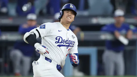 Los Angeles Dodgers designated hitter Shohei Ohtani (17) celebrates after hitting a home run as we dive into our Shohei Ohtani player prop bets for World Series Game 4.