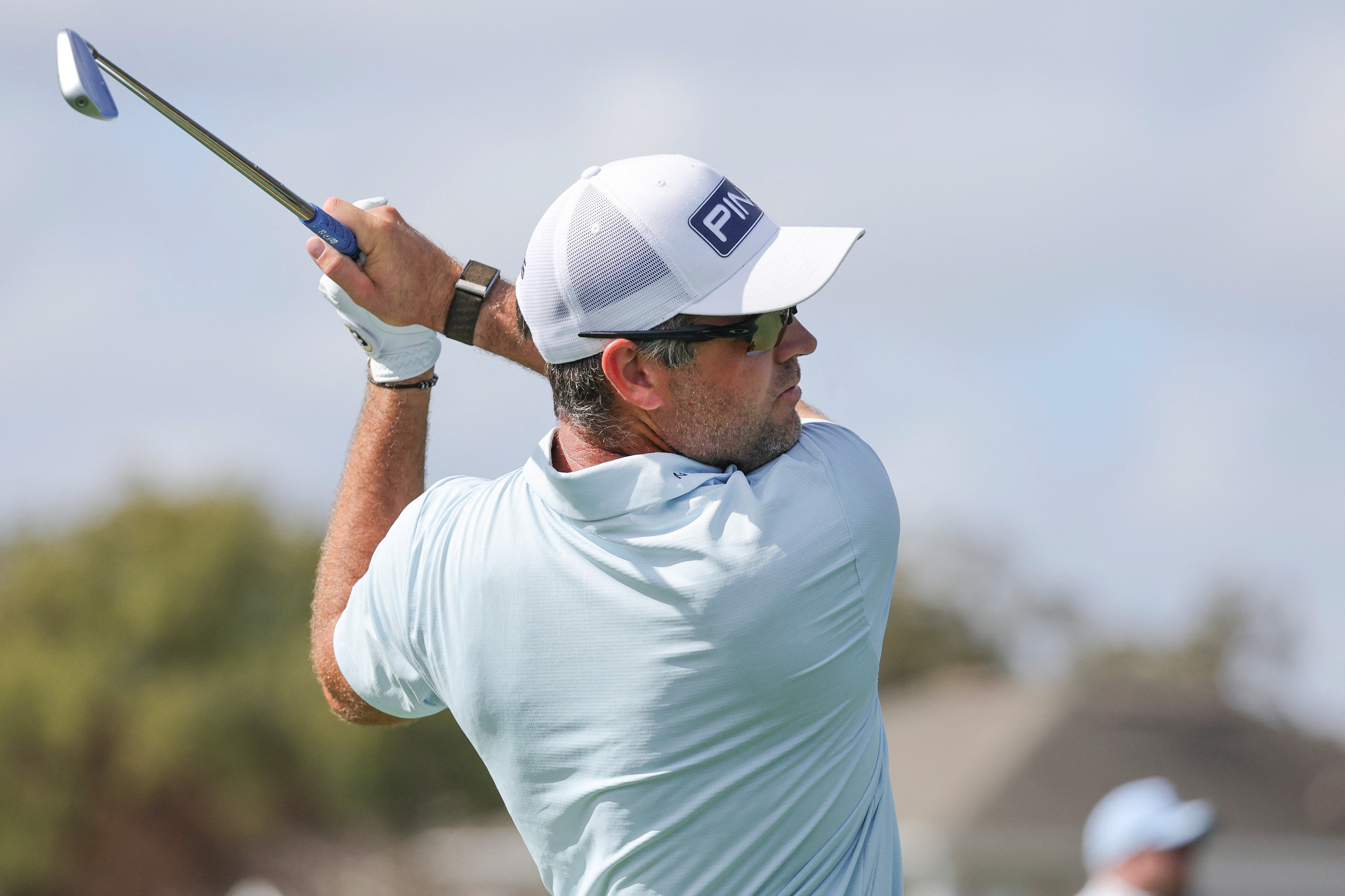 Corey Conners plays his shot from the seventh tee as he is featured in our PLAYERS Championship long shots & sleeper picks.