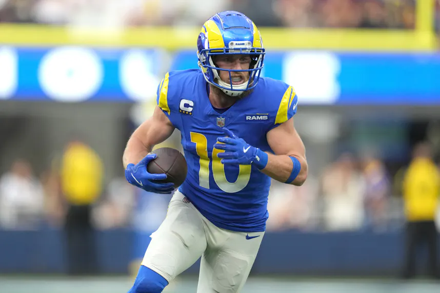 Los Angeles Rams wide receiver Cooper Kupp carries the ball against the Washington Commanders as we look at our Rams vs. Lions player props.