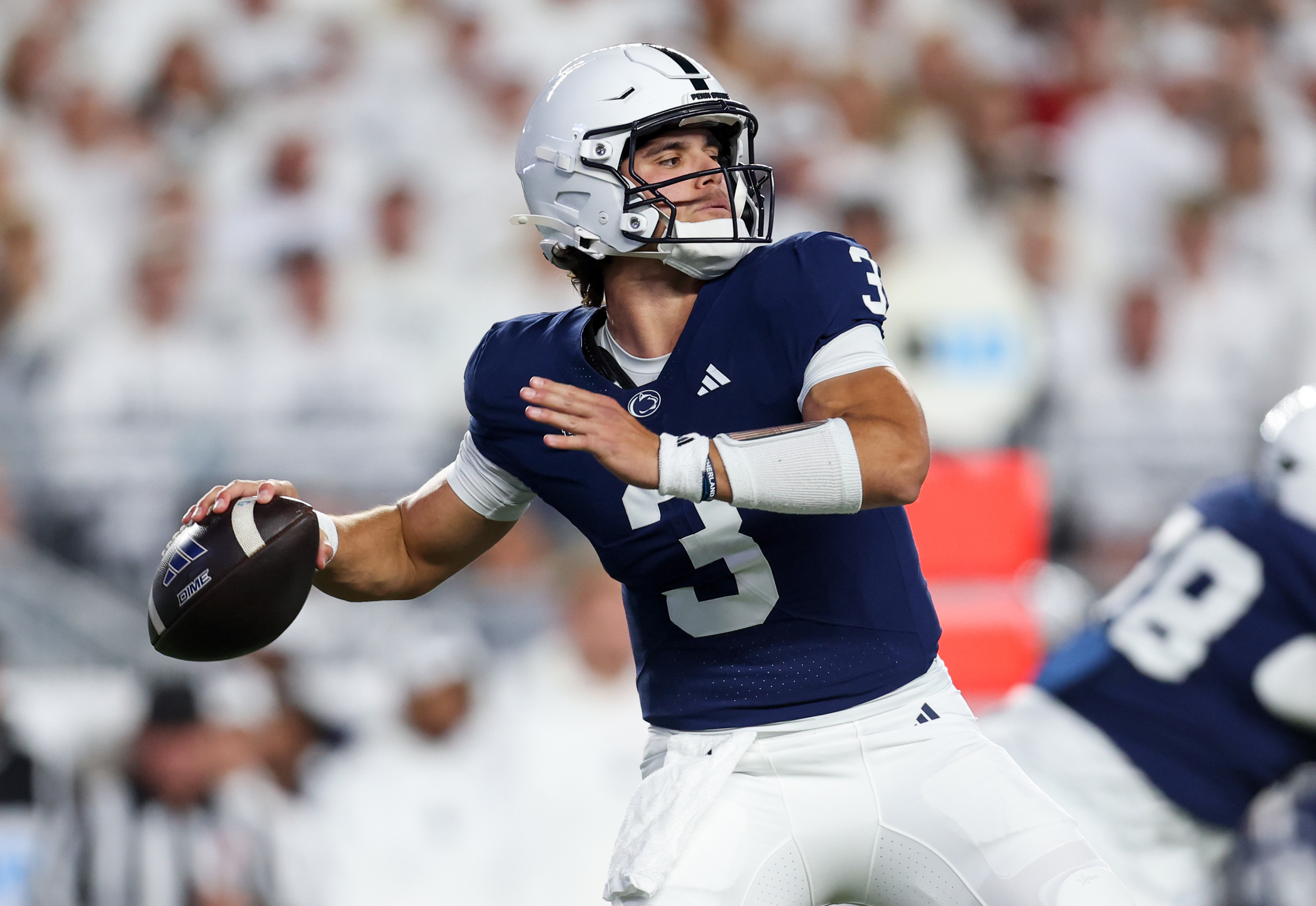 Penn State Nittany Lions quarterback Rocco Becht throws a pass as we make our best Penn State vs. Michigan prediction
