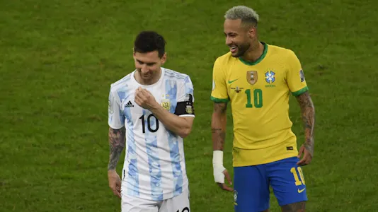 Argentina's Lionel Messi and Brazil's Neymar smile during the Conmebol 2021 Copa America tournament final. 