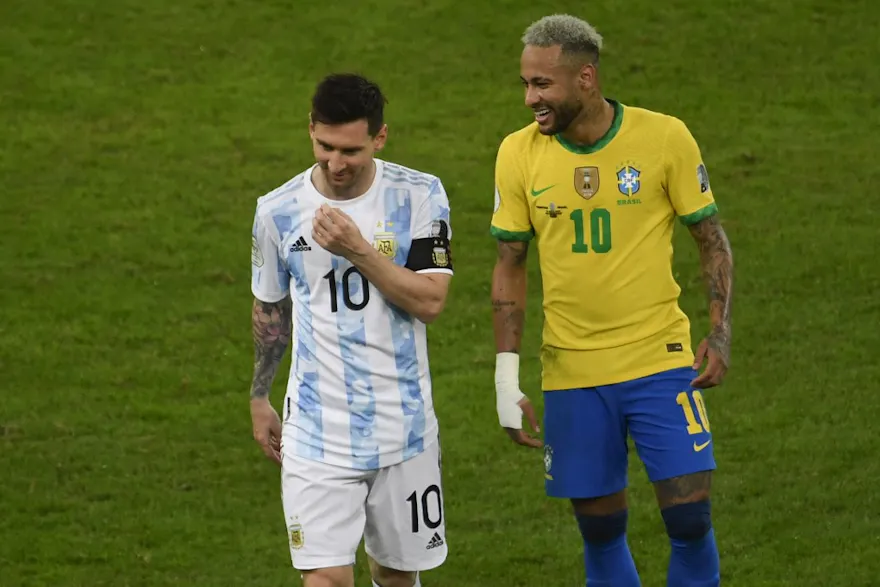 Argentina's Lionel Messi and Brazil's Neymar smile during the Conmebol 2021 Copa America tournament final. 