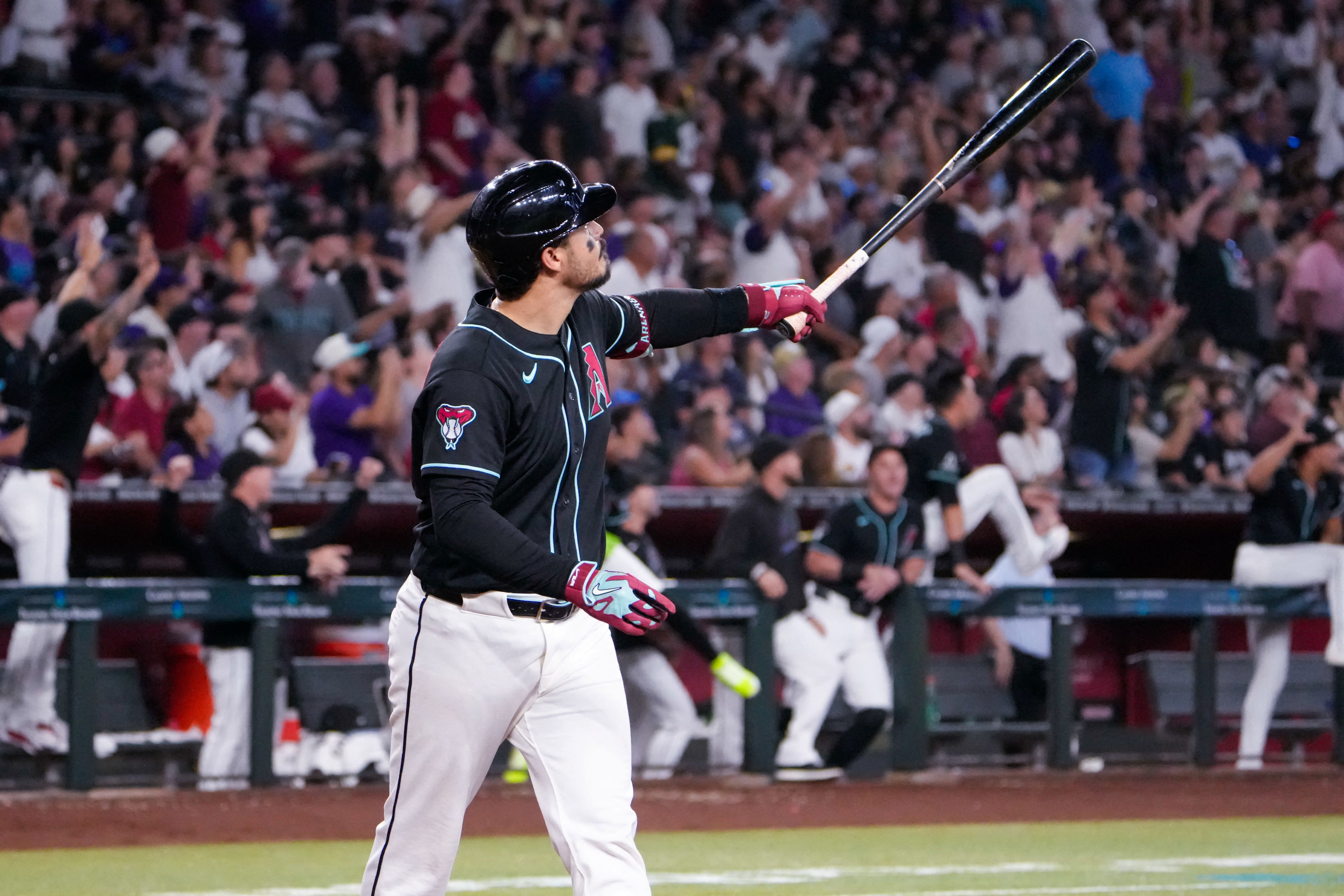 Diamondbacks 3B Nolan Arenado celebrates after hitting a grand slam while we make our best home run predictions today