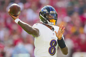 Lamar Jackson, featured in the Ravens vs. Dolphins Prediction, throws a pass against the Kansas City Chiefs. Photo by Jay Biggerstaff via Imagn Images