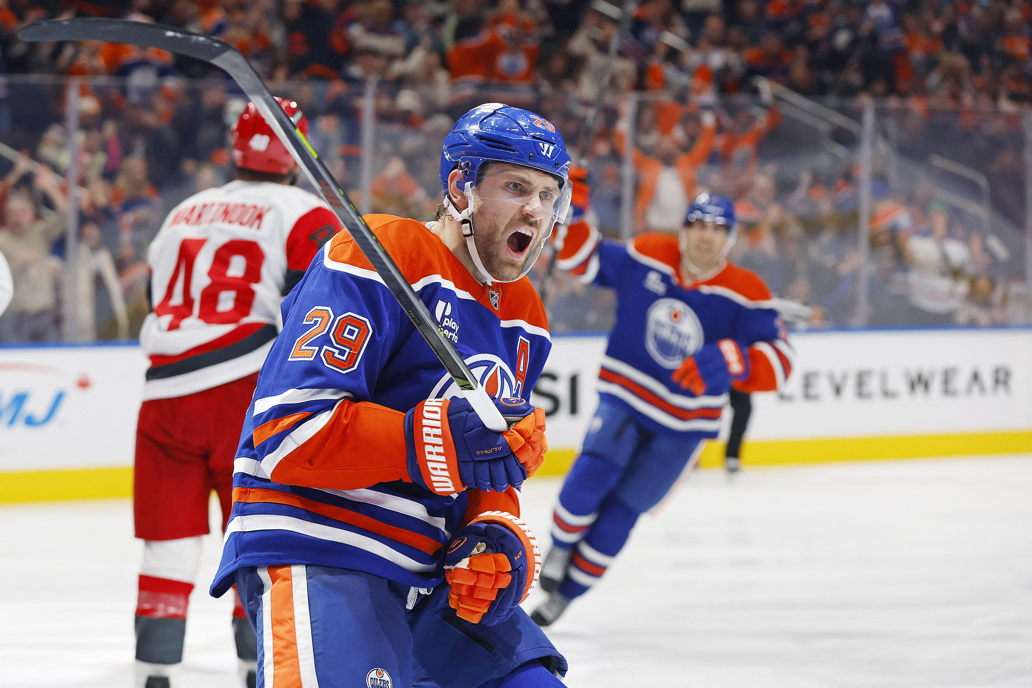Edmonton Oilers forward Leon Draisaitl (29) celebrates as we break down our NHL predictions today.