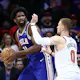 Joel Embiid of the Philadelphia 76ers is guarded by Donte DiVincenzo of the New York Knicks during the fourth quarter of game three of the Eastern Conference First Round Playoffs. We're backing Embiid in our Knicks vs. 76ers player props. 