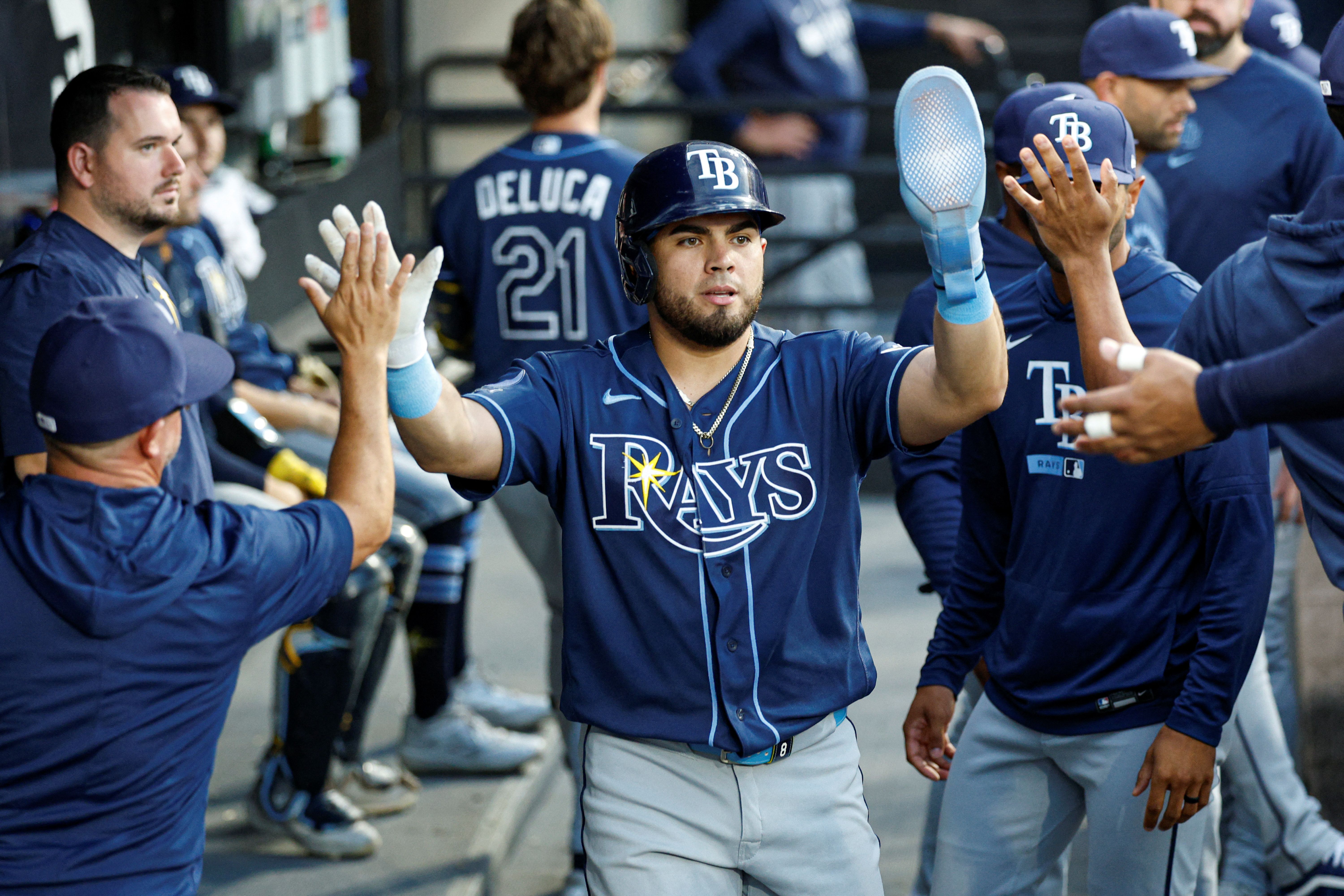 Tampa Bay Rays first baseman Jonathan Aranda celebrates with teammates, and he's key as we look at the Rays vs. Red Sox win probability.