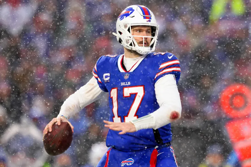 Josh Allen of the Buffalo Bills throws a pass against the Cincinnati Bengals, and we offer our top Bills vs. Chargers prediction based on the best NFL odds.