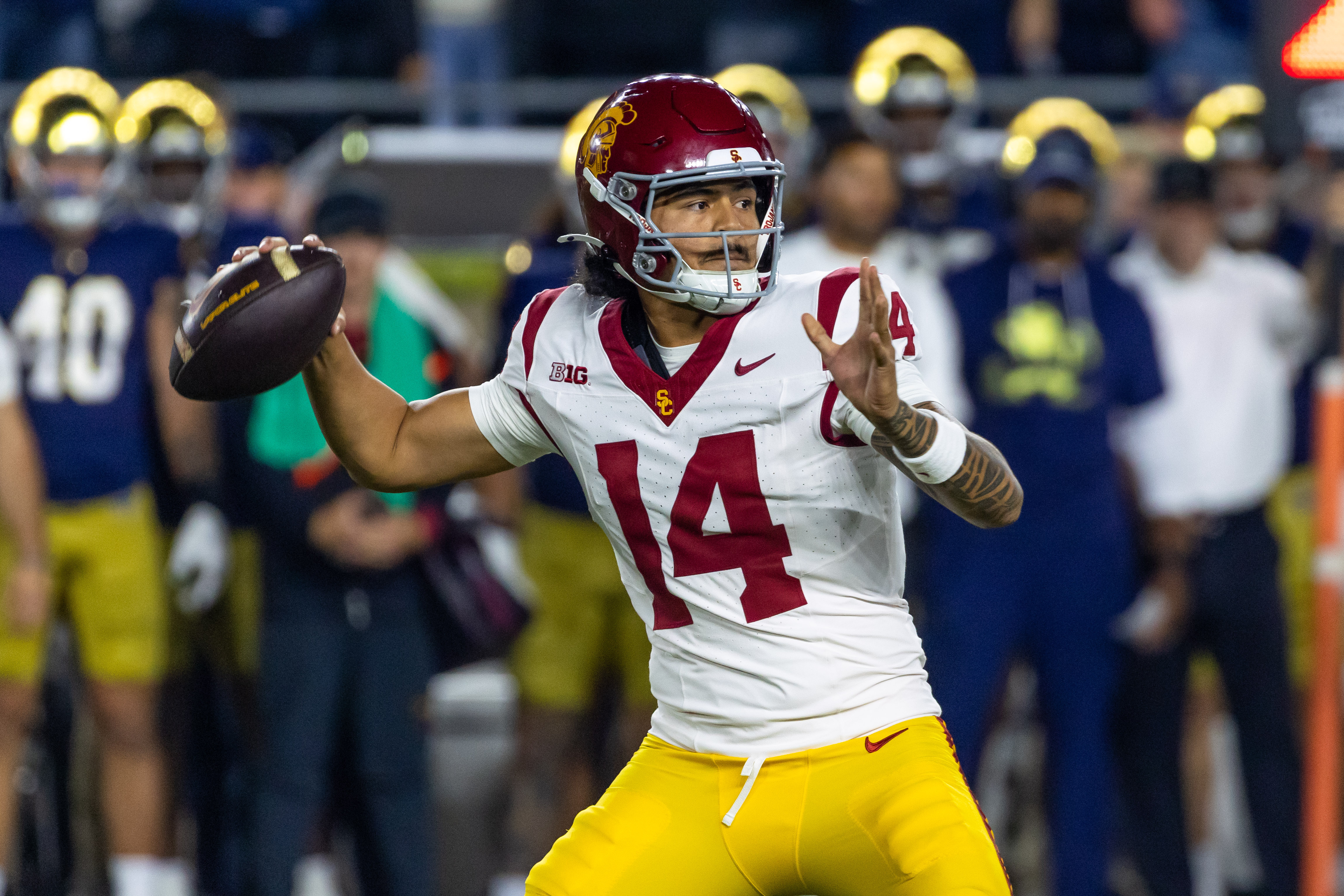 Southern California Trojans quarterback Jayden Maiava (14) passes the ball as we dive into our USC vs. TCU predictions and odds for the 2025 Alamo Bowl.