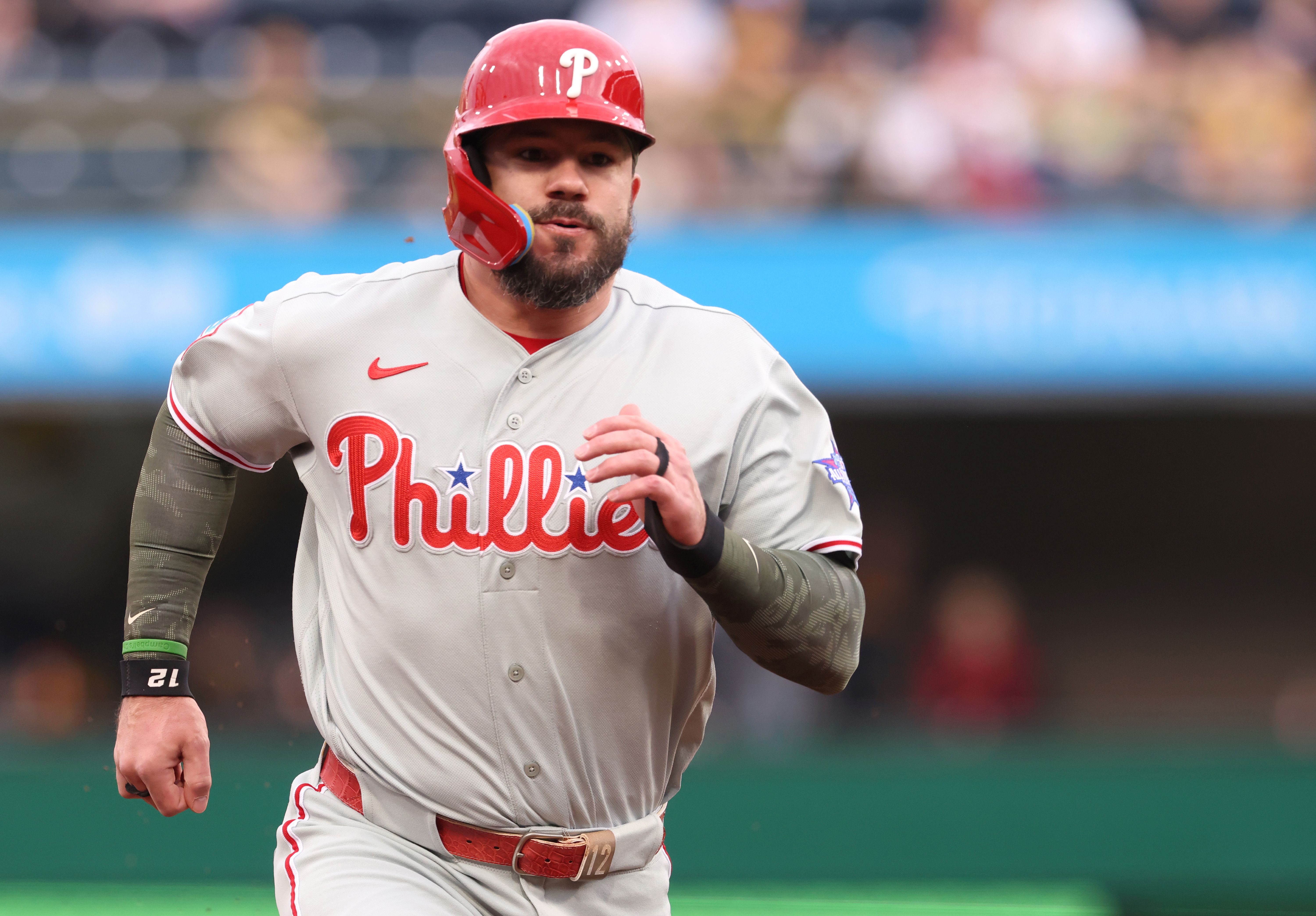 Philadelphia Phillies designated hitter Kyle Schwarber runs from first base to third base, and he's key as we look at our home run predictions today.