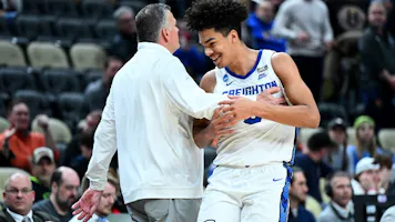 Head coach Greg McDermott and Jasen Green #0 of the Creighton Bluejays react as we offer our Creighton vs. Tennessee expert picks and prediction for the Sweet 16 of the NCAA Tournament on Friday.