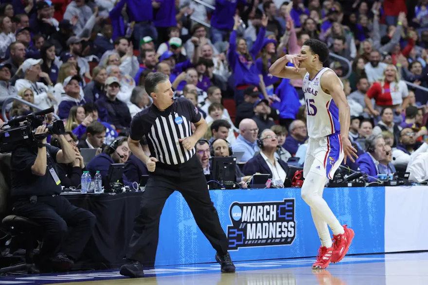 Kevin McCullar Jr. of the Kansas Jayhawks reacts after his basket as we share our top Kansas vs. Kentucky prediction.