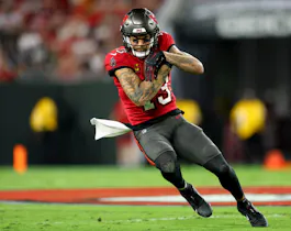 Mike Evans of the Tampa Bay Buccaneers carries the ball against the Baltimore Ravens during the first quarter at Raymond James Stadium on October 27, 2022 in Tampa, Florida.