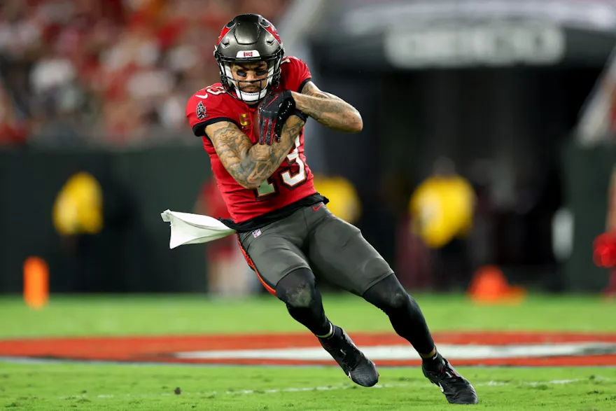 Mike Evans of the Tampa Bay Buccaneers carries the ball against the Baltimore Ravens during the first quarter at Raymond James Stadium on October 27, 2022 in Tampa, Florida.