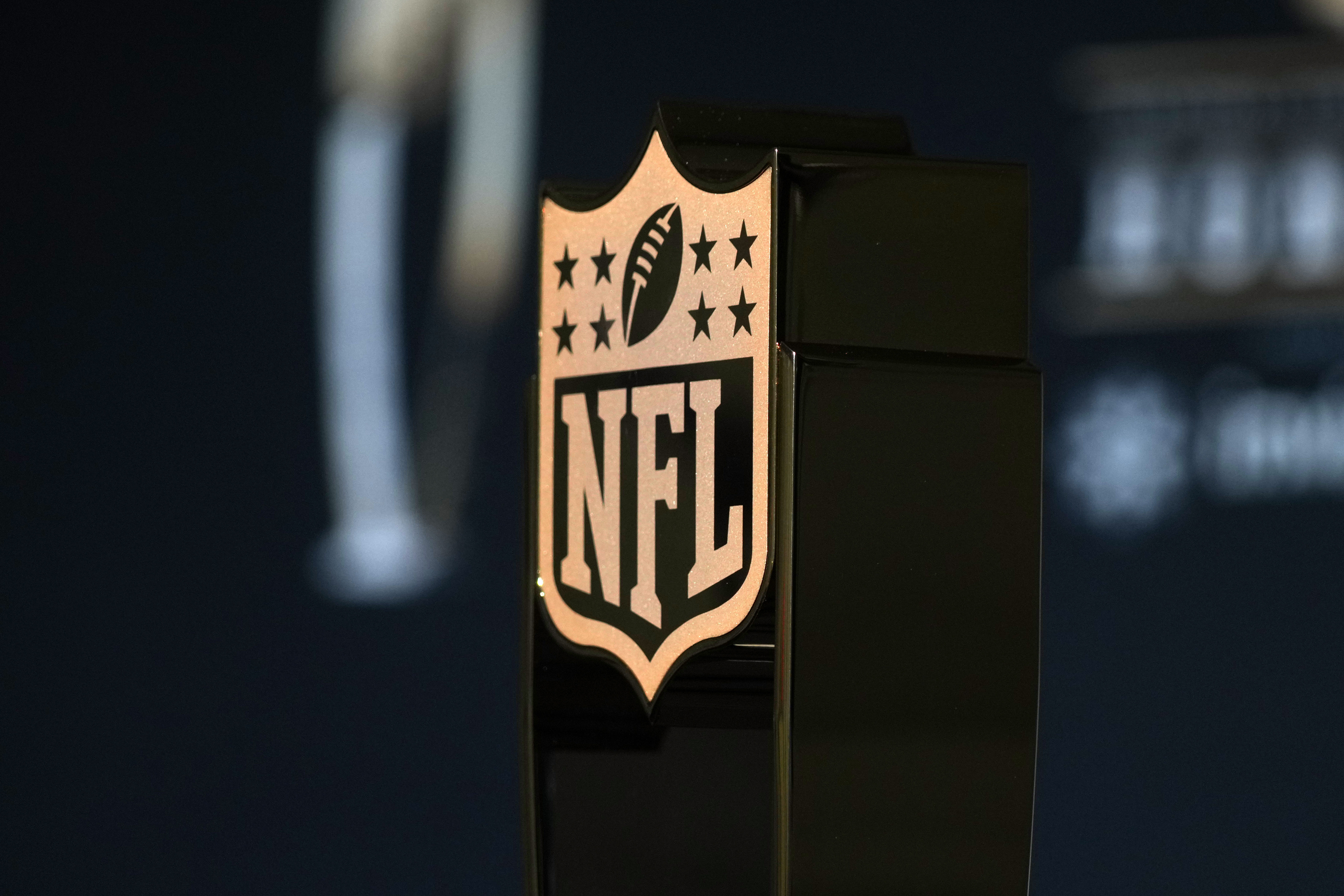 An NFL Honors trophy as we provide our NFL award predictions for 2026.