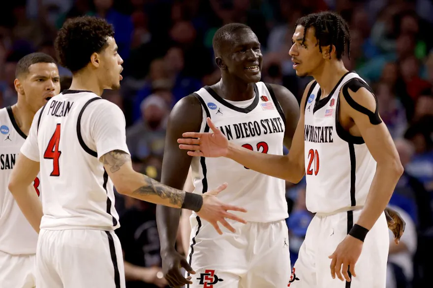 Trey Pulliam and Chad Baker-Mazara of the San Diego State Aztecs celebrate during the first half against the Creighton Bluejays.