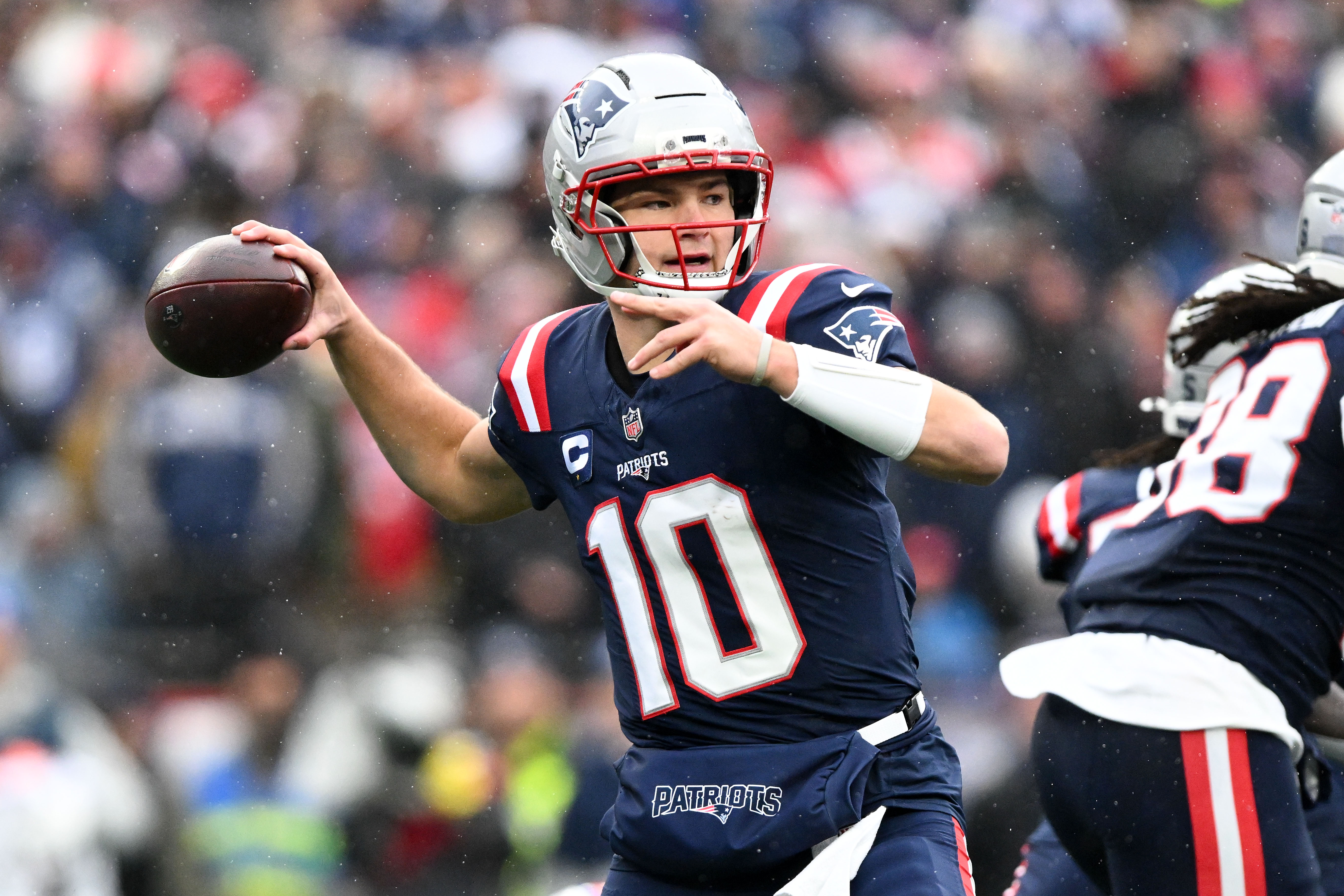 New England Patriots quarterback Drake Maye (10) throws the ball as we offer our Patriots vs. Ravens predictions for Sunday Night Football.