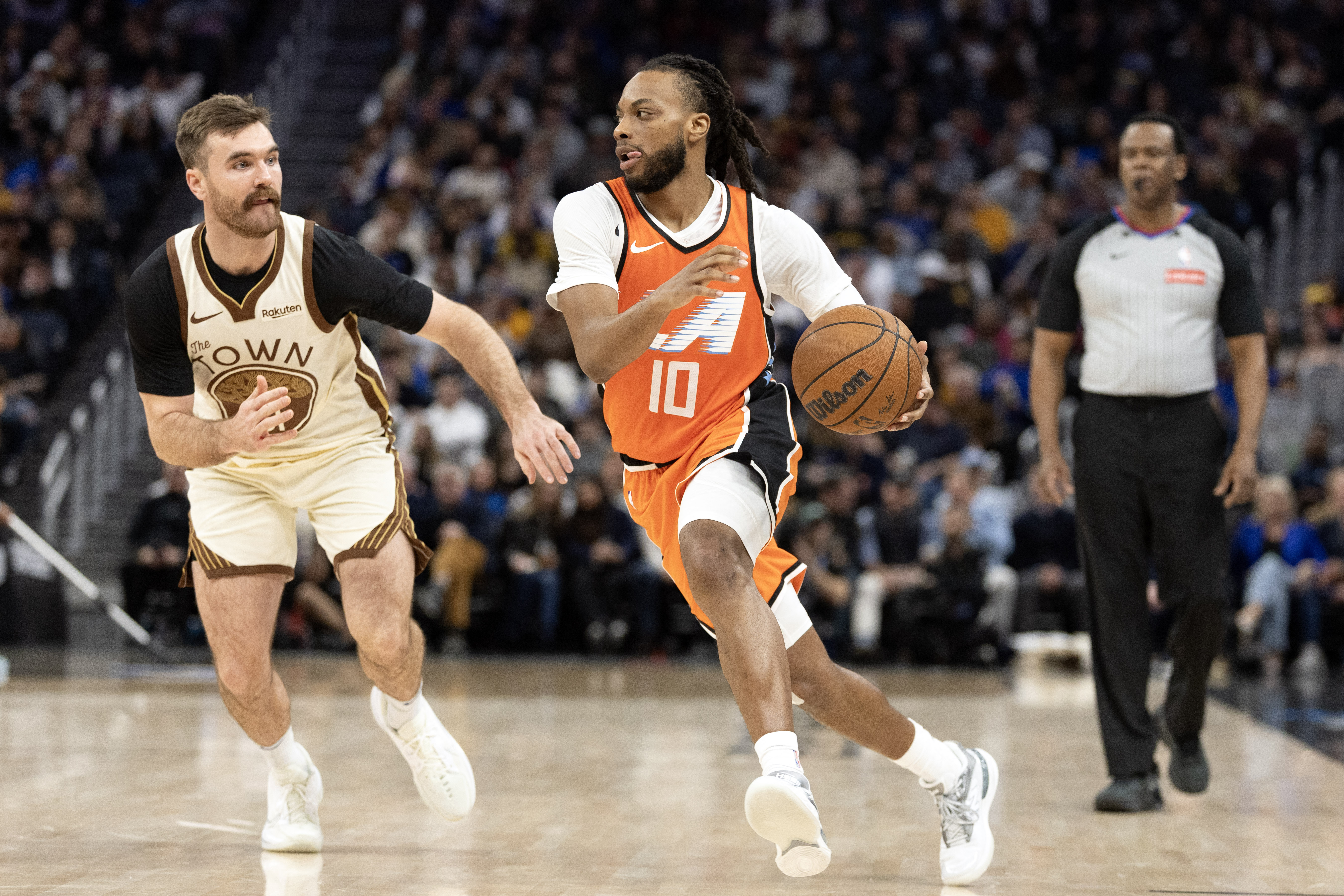 LA Clippers guard Darius Garland (10), seen here controlling the ball, is featured in our NBA player props tonight.