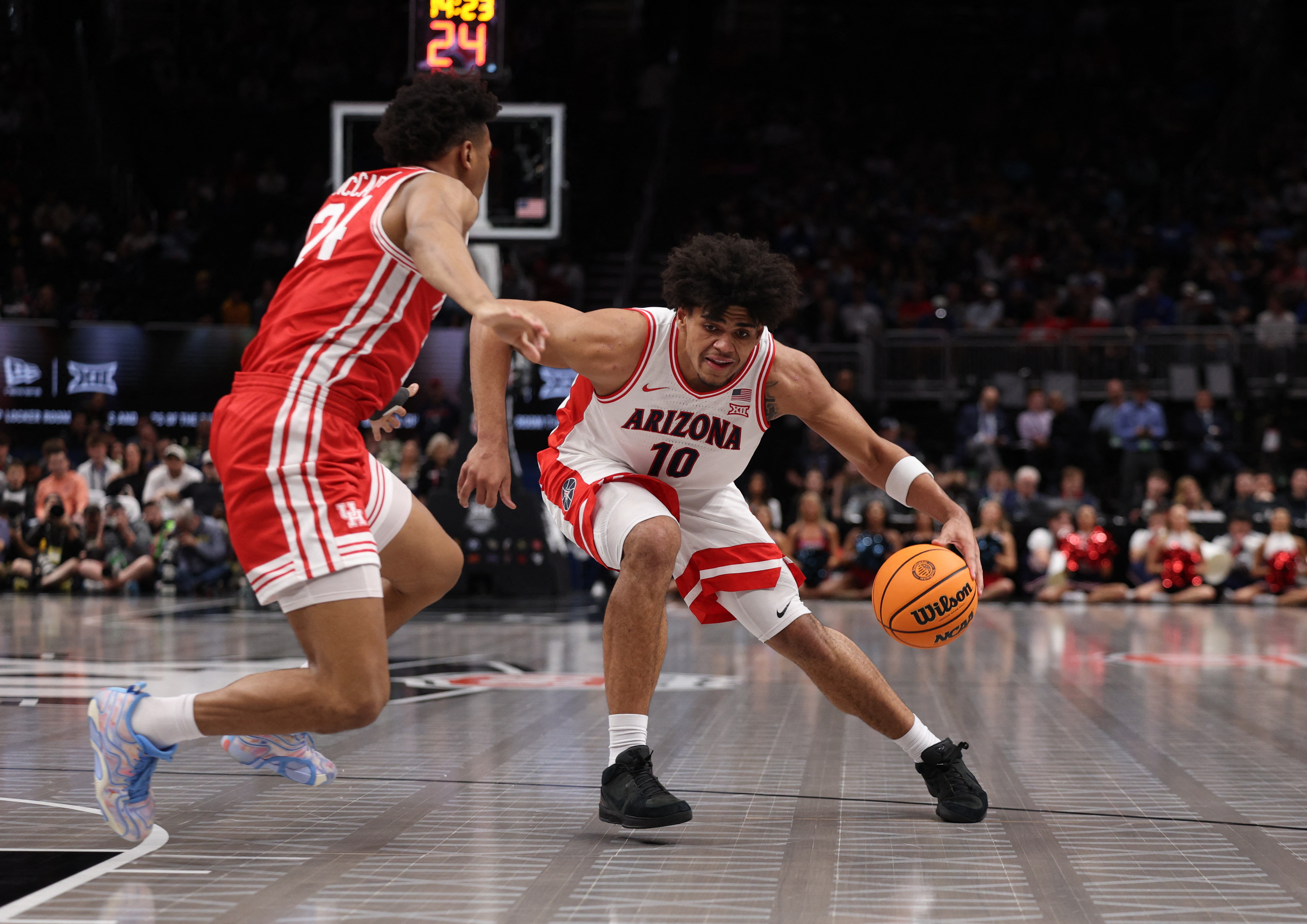 Arizona Wildcats forward Koa Peat drives to the hoop as we make our best player props for the Final Four.