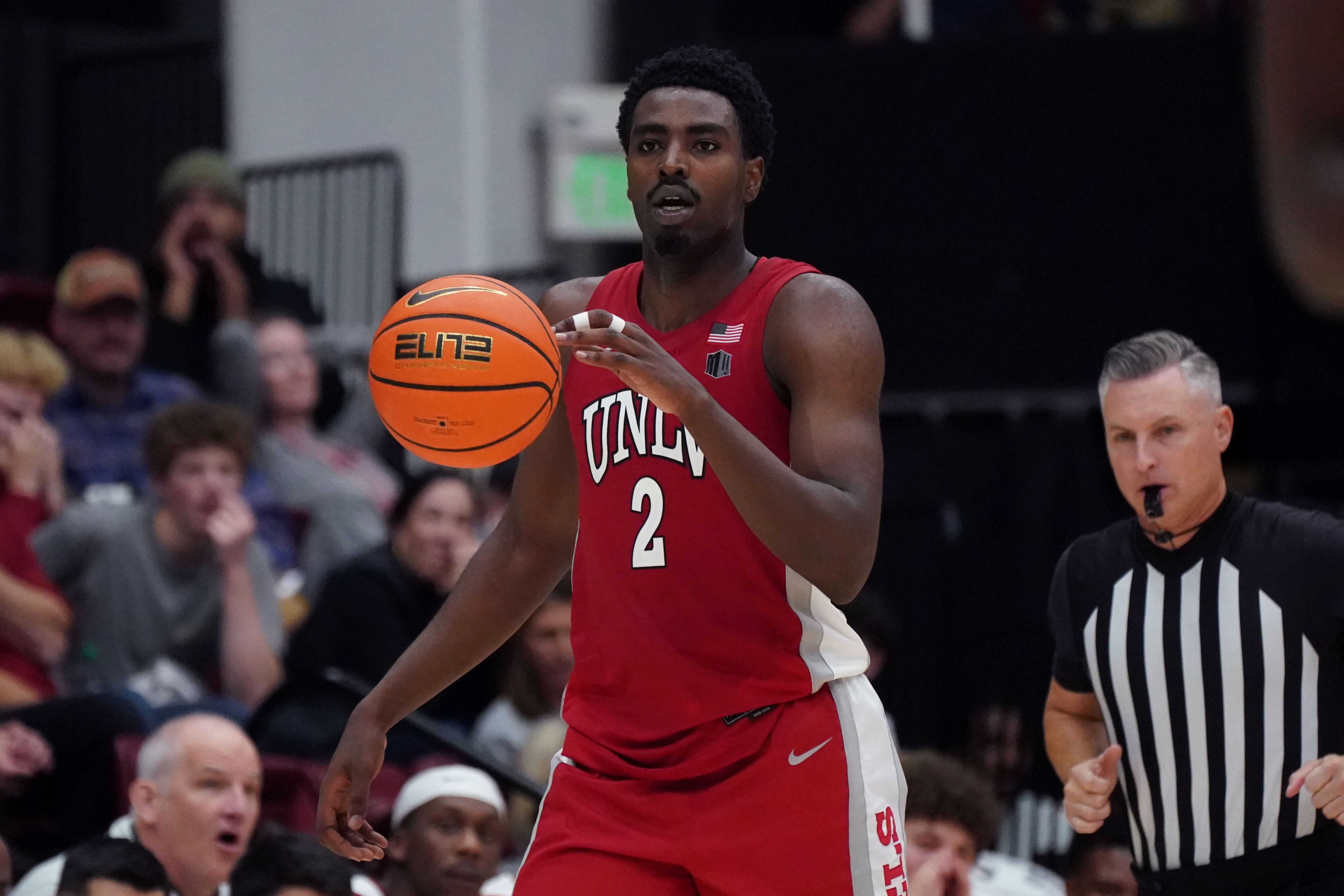 UNLV Runnin' Rebels forward Kimani Hamilton dribbles upcourt, and he's key as we look at our college basketball best bets