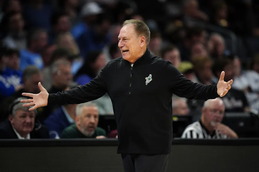 Head coach Tom Izzo of the Michigan State Spartans reacts as we make our Michigan State vs. UNC expert pick and prediction for the second round of the NCAA Tournament on Saturday.