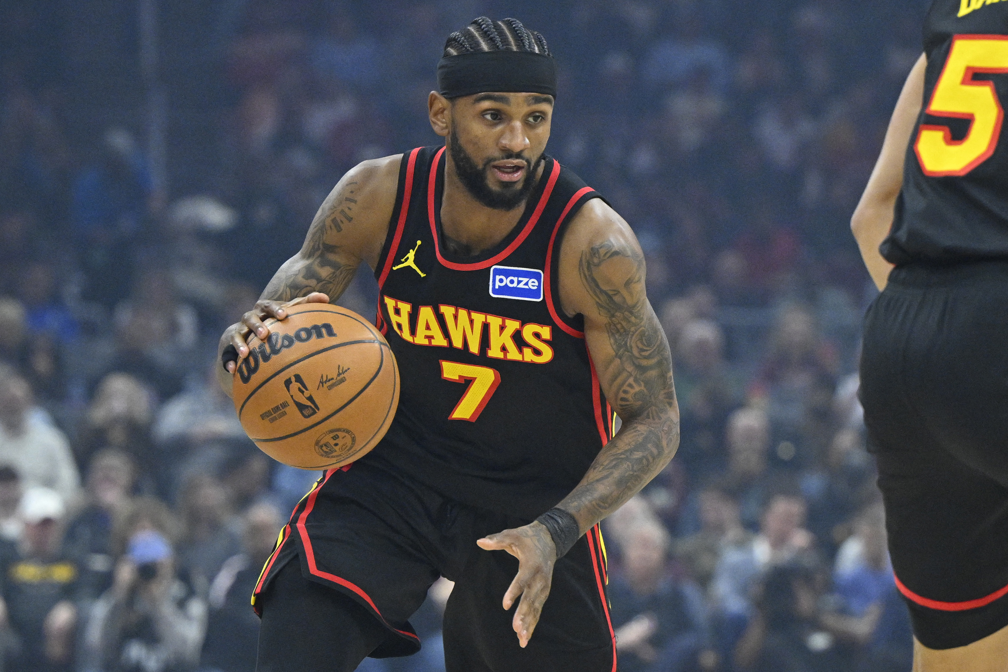 Atlanta Hawks guard Nickeil Alexander-Walker (7) brings the ball up court as we break down our Cavaliers vs. Hawks player props today.