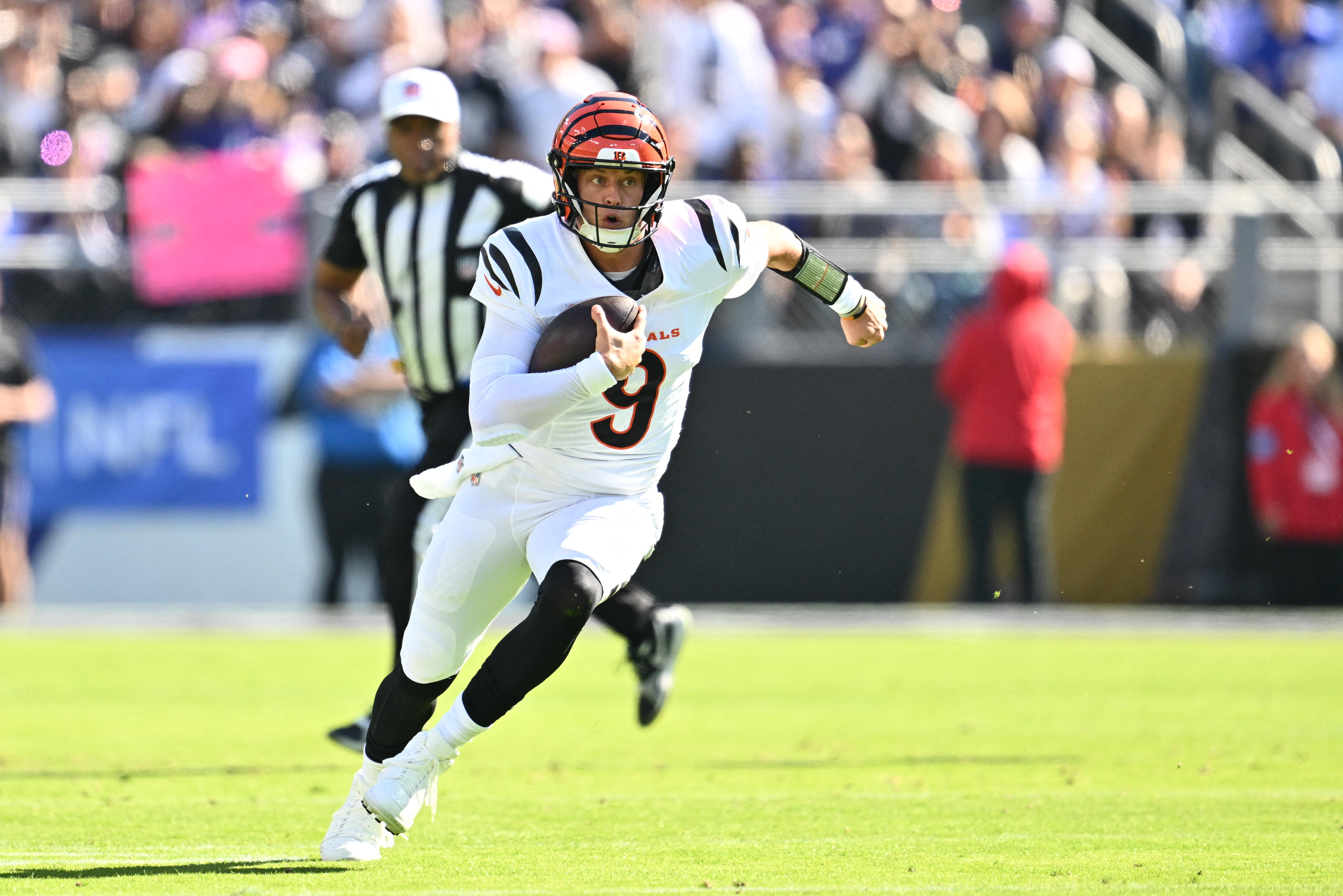 Cincinnati Bengals quarterback Joe Burrow (9) runs the ball during the first quarter as we make our best Week 8 NFL Survivor prediction.