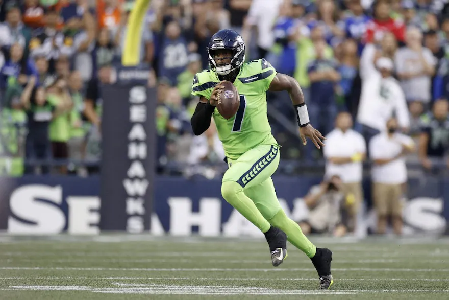 Geno Smith of the Seattle Seahawks carries the ball during the third quarter against the Denver Broncos.