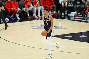 San Antonio Spurs forward/center Victor Wembanyama (1) dribbles up the court as part of our Heat vs. Spurs Player Props.