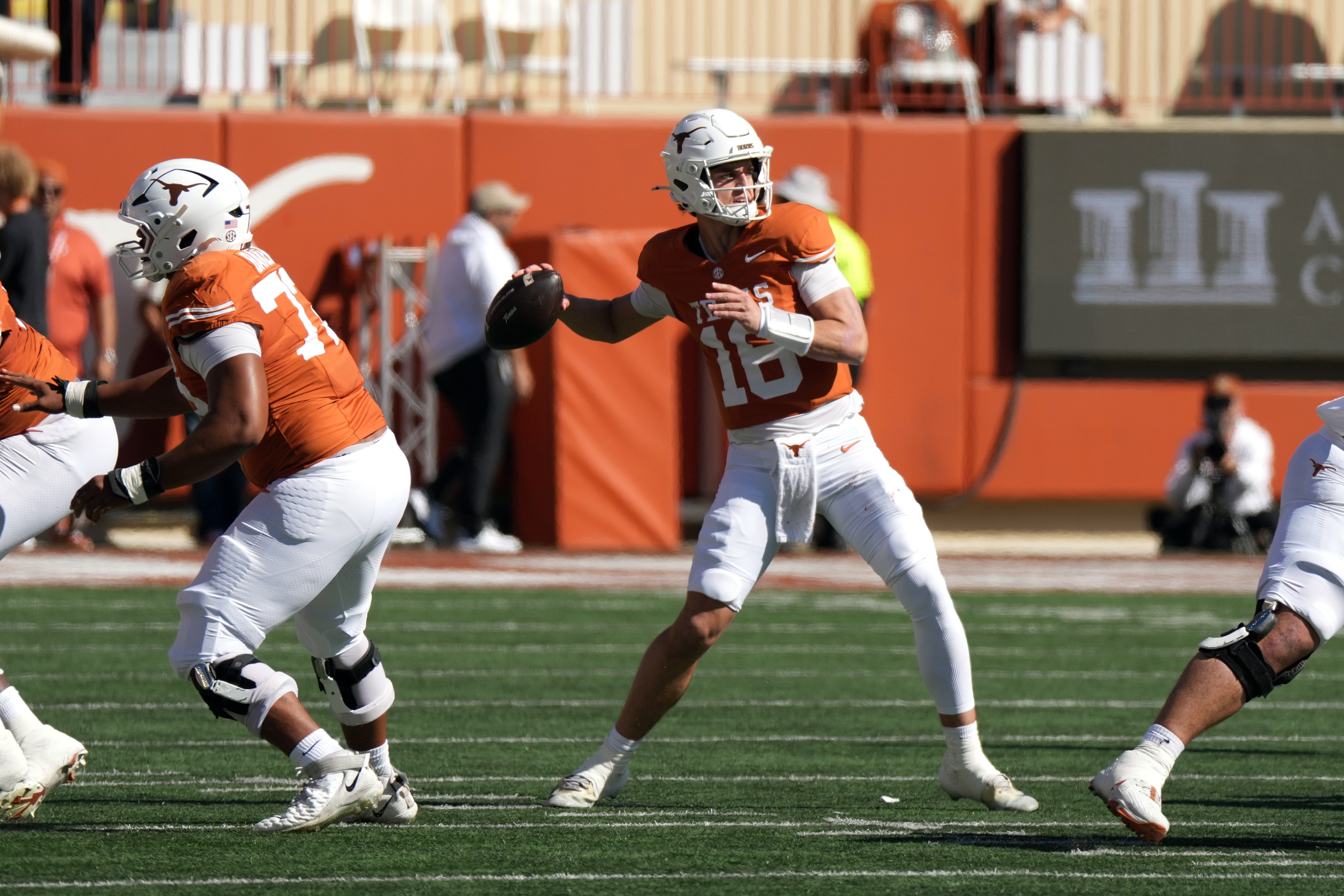 Texas Longhorns quarterback Arch Manning (16) throws a pass as he is featured in our Ole Miss vs. Texas expert picks for Saturday.