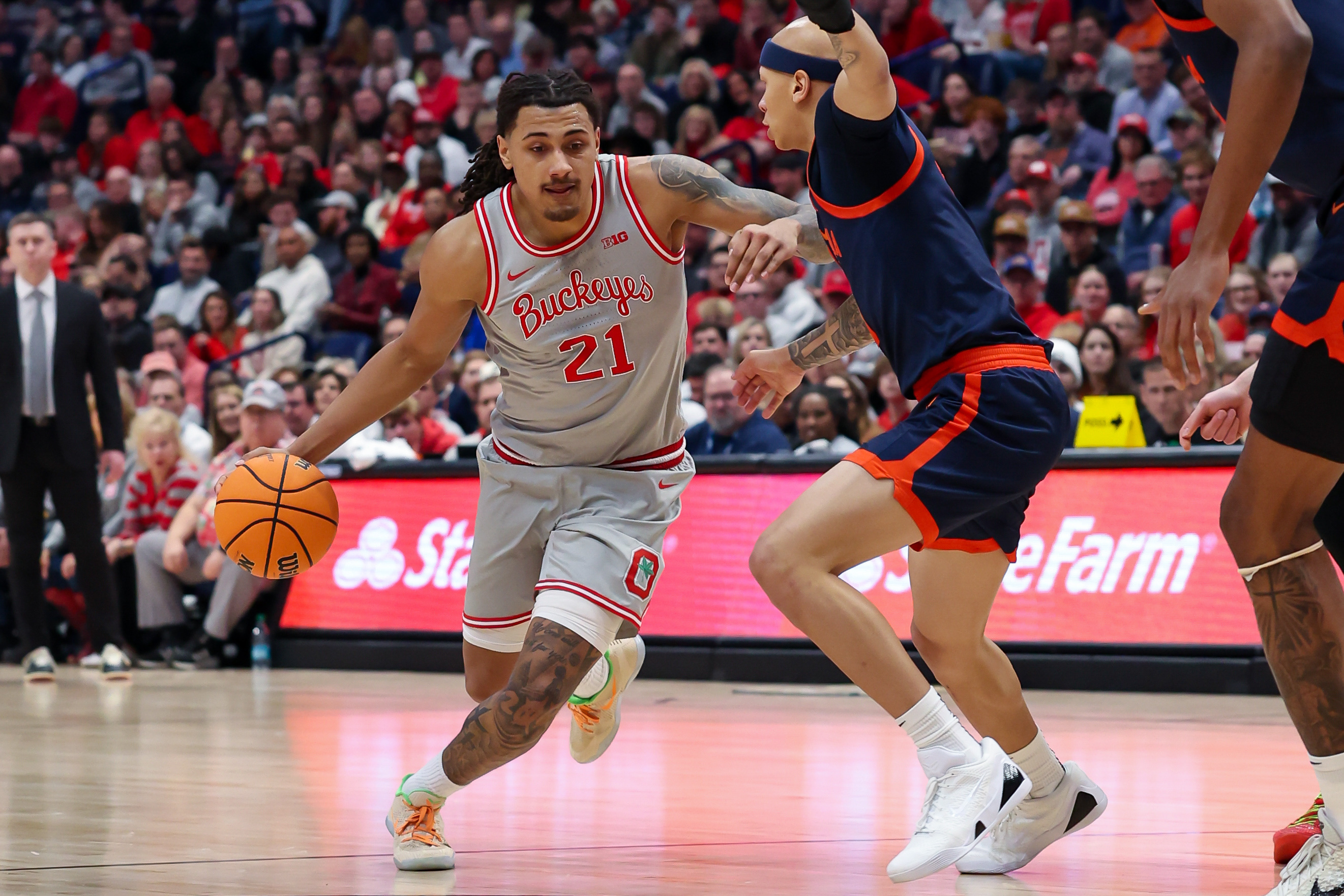 Devin Royal drives to the basket as we provide our Purdue vs. Ohio State prediction. 