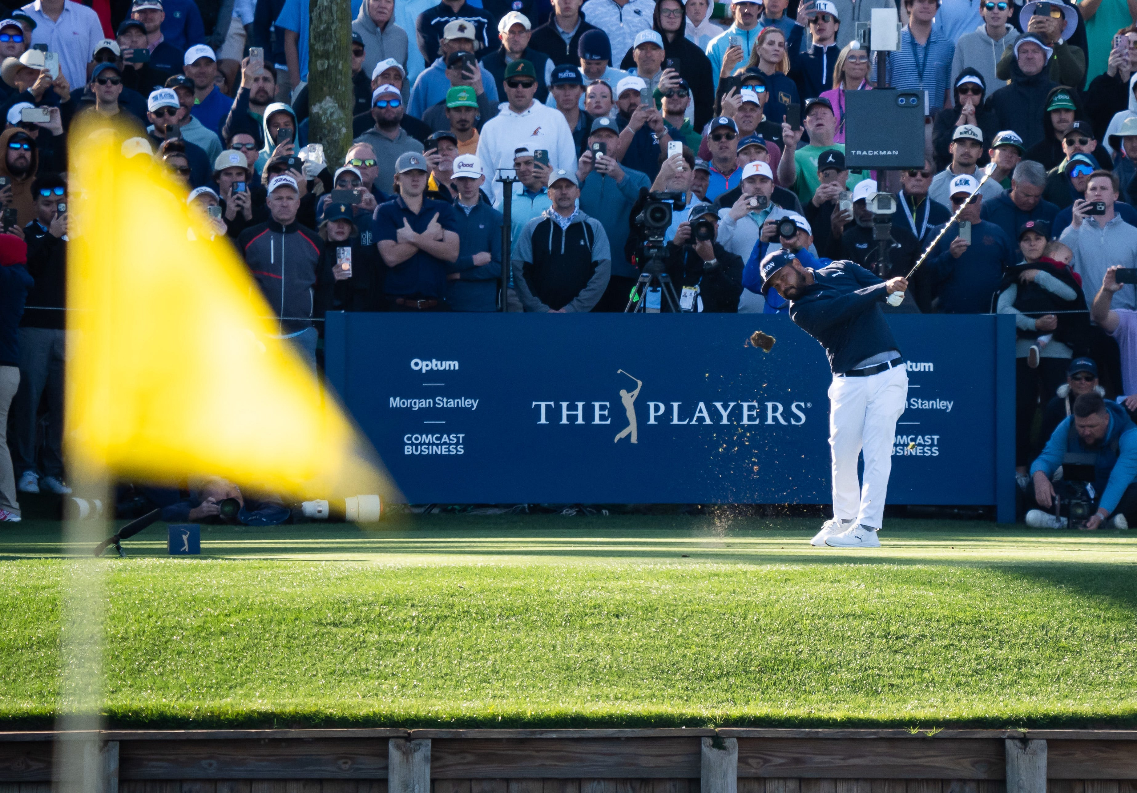 J.J. Spaun tees off on the 17th hole during a three-hole aggregate playoff of the Players Championship at TPC Sawgrass. 