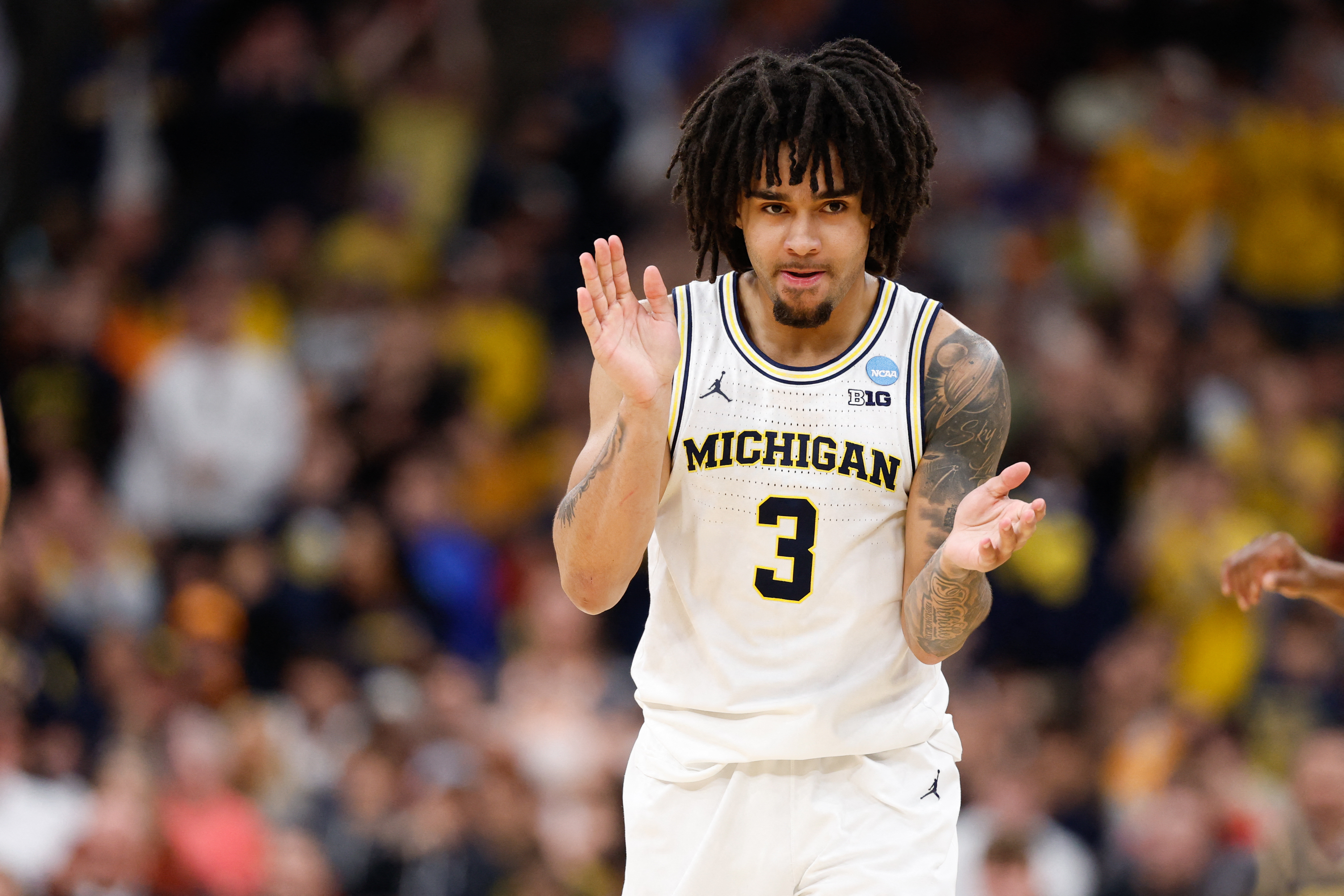 Michigan Wolverines guard Elliot Cadeau (3) reacts as we break down our Michigan vs. Arizona player props.