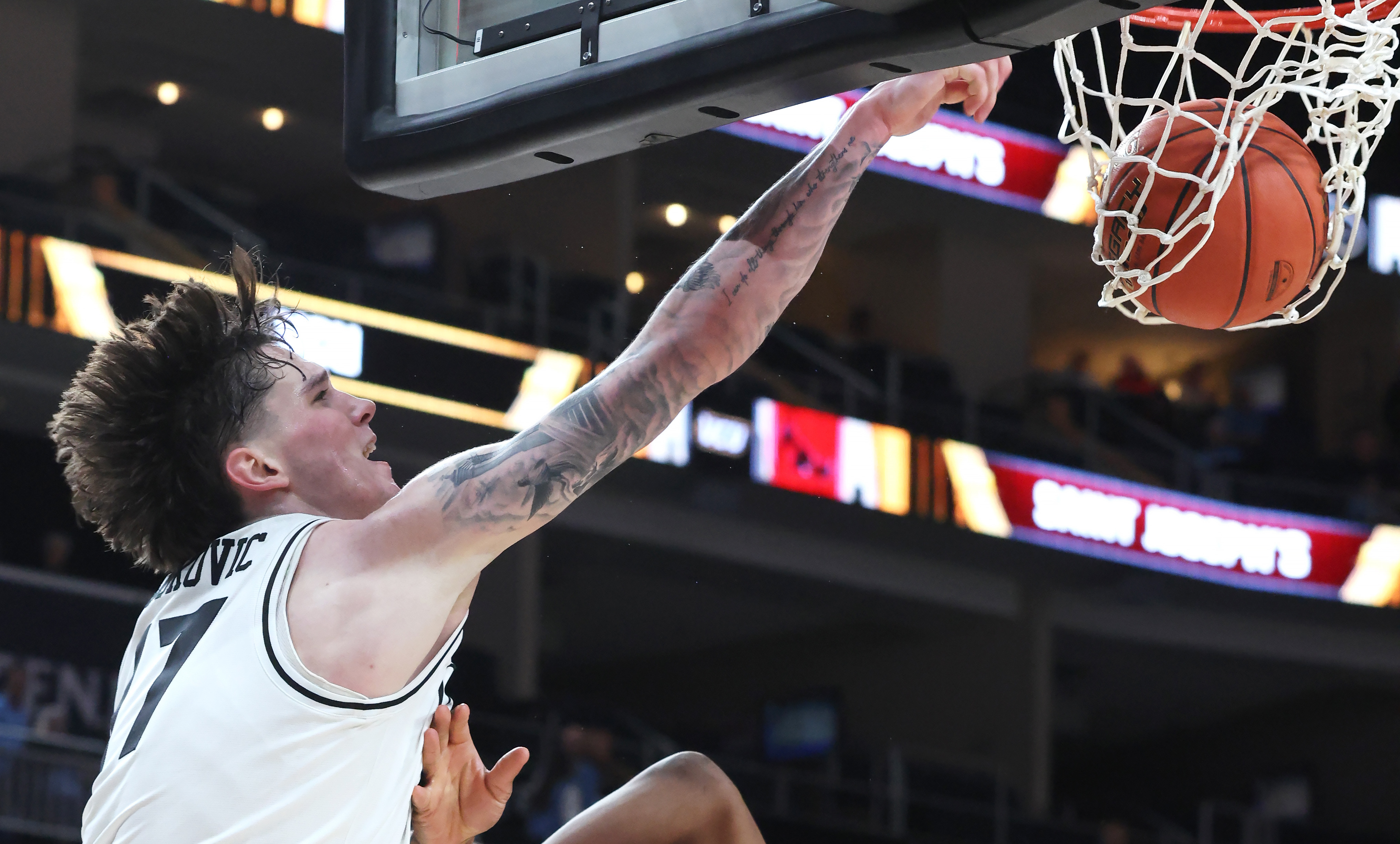 VCU Rams forward Lazar Djokovic dunks.