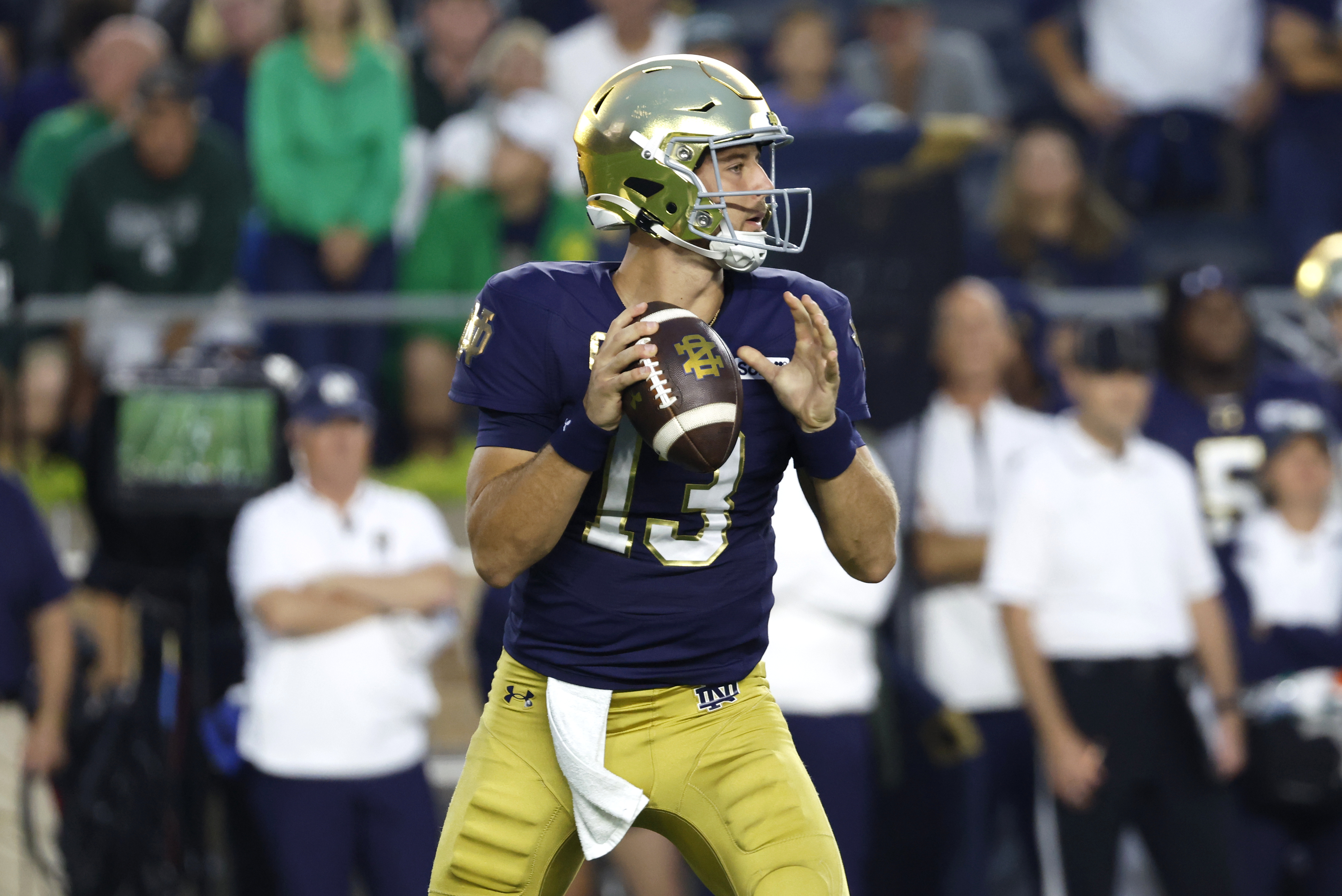 Notre Dame quarterback CJ Carr (13) looks to pass as we break down our Notre Dame vs. North Carolina prediction.
