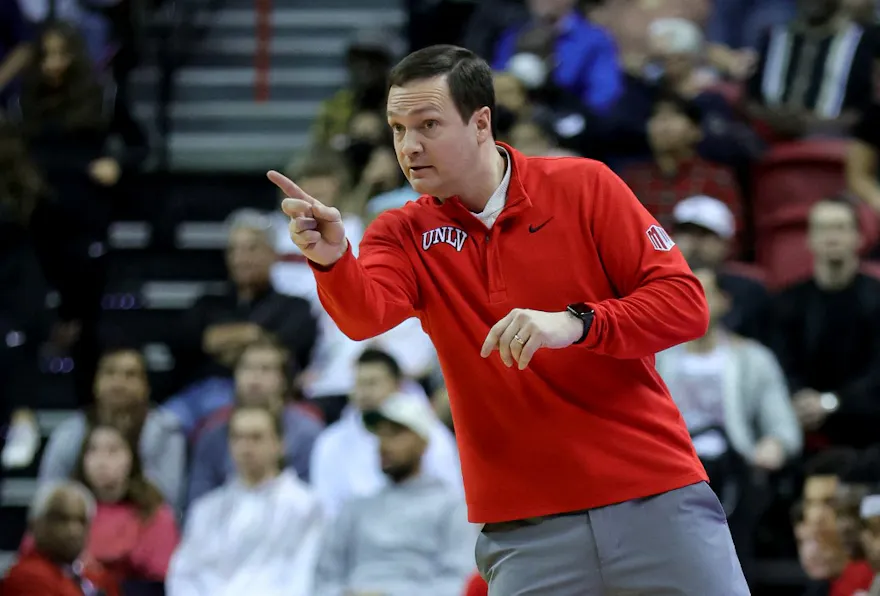 Head coach Kevin Kruger of the UNLV Rebels gestures during a game against the Colorado State Rams at the Thomas & Mack Center on February 19, 2022 in Las Vegas, Nevada. The Rebels defeated the Rams 72-51.
