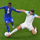USA's forward #21 Timothy Weah fights for the ball with England's defender #06 Harry Maguire during the Qatar 2022 World Cup Group B football match between England and USA at the Al-Bayt Stadium in Al Khor, north of Doha on November 25, 2022.