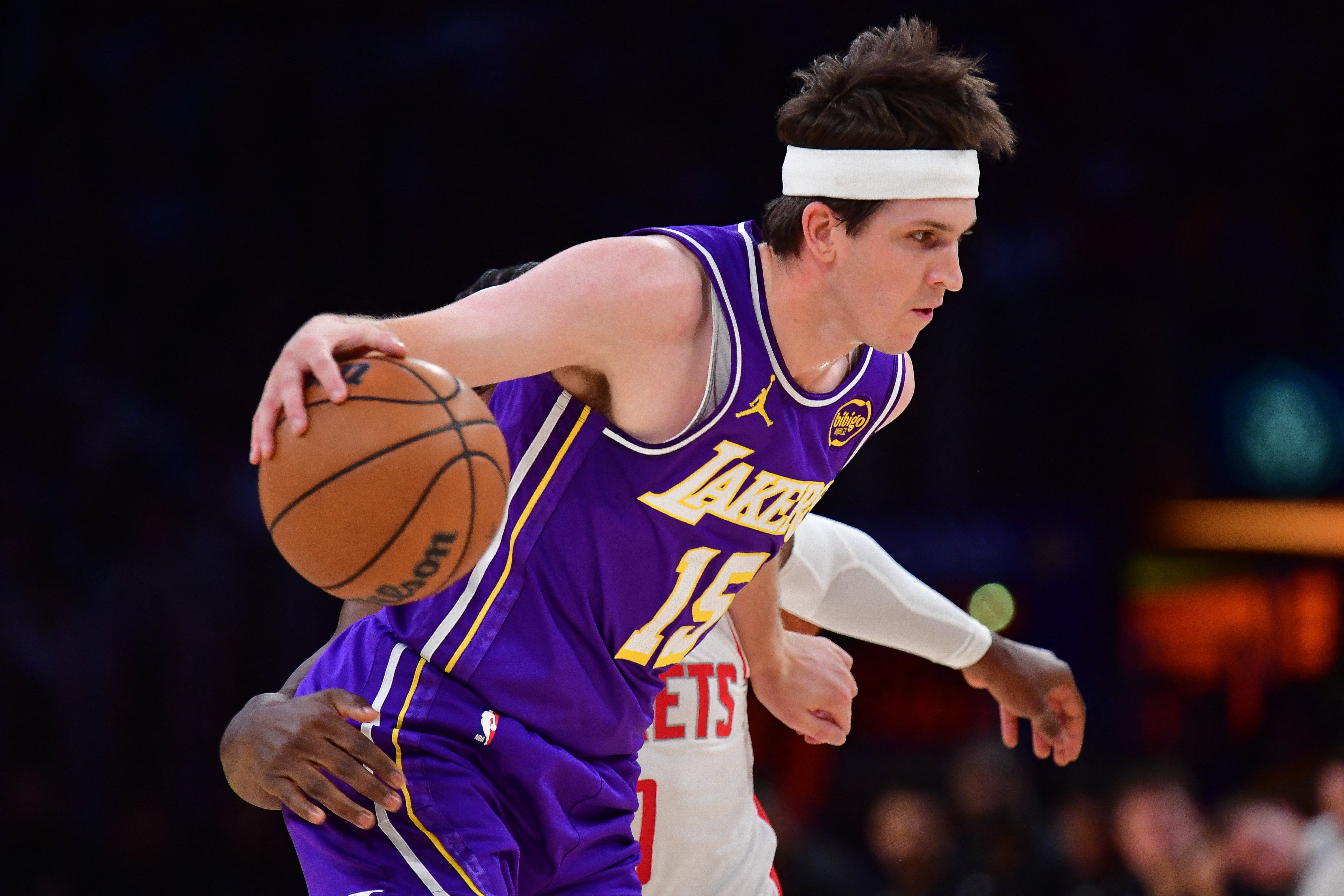 Los Angeles Lakers guard Austin Reaves (15), seen here dribbling during a game, is featured in our NBA player props today.