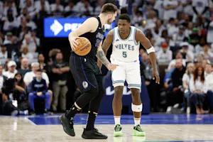 Luka Doncic of the Dallas Mavericks drives to the basket against Anthony Edwards of the Minnesota Timberwolves during Game 2 of the Western Conference Finals. We're backing Doncic in our Timberwolves vs. Mavericks Player Props. 
