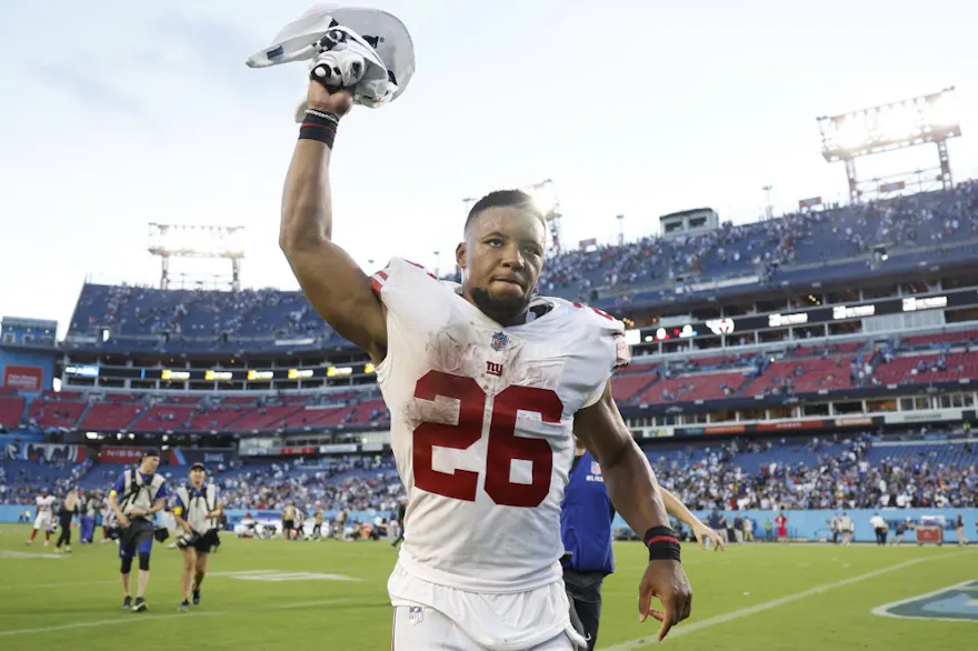 Running back Saquon Barkley of the New York Giants celebrates after his team's victory against the Tennessee Titans, and we offer new U.S. bettors our exclusive bet365 bonus code for NFL Week 7.