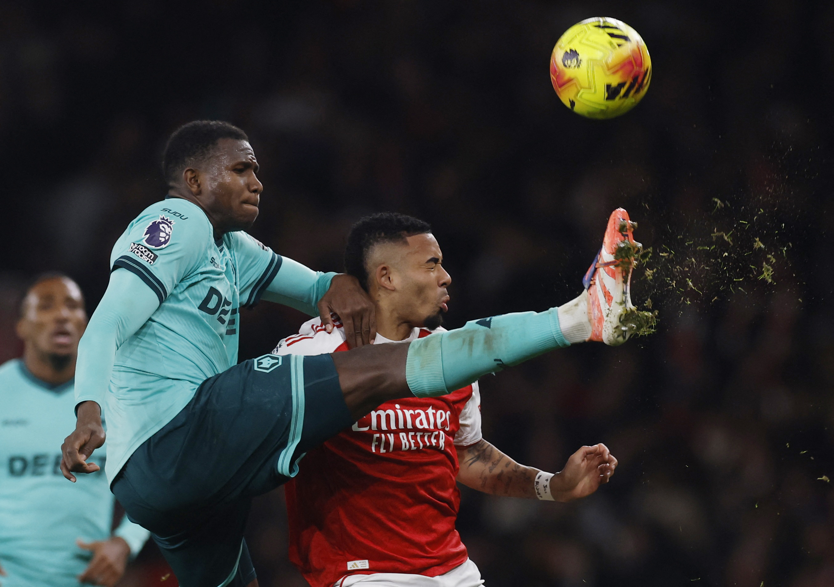 Wolves' Yerson Mosquera in action with Arsenal's Jesus as we make our best Wolves vs. Arsenal parlay.