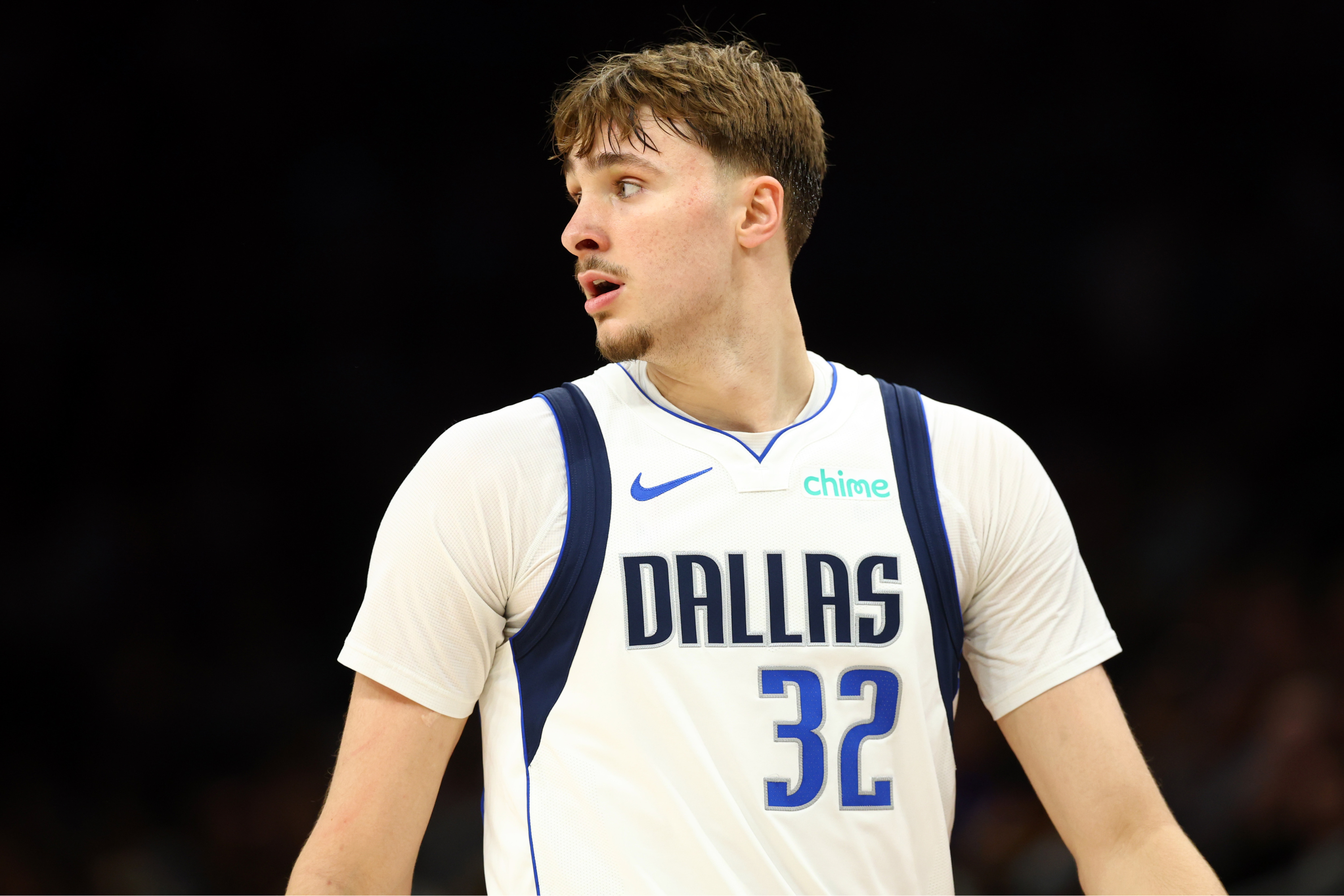 Dallas Mavericks forward Cooper Flagg (32), seen here looking on during a game, is featured in our NBA Rookie of the Year odds 2026.