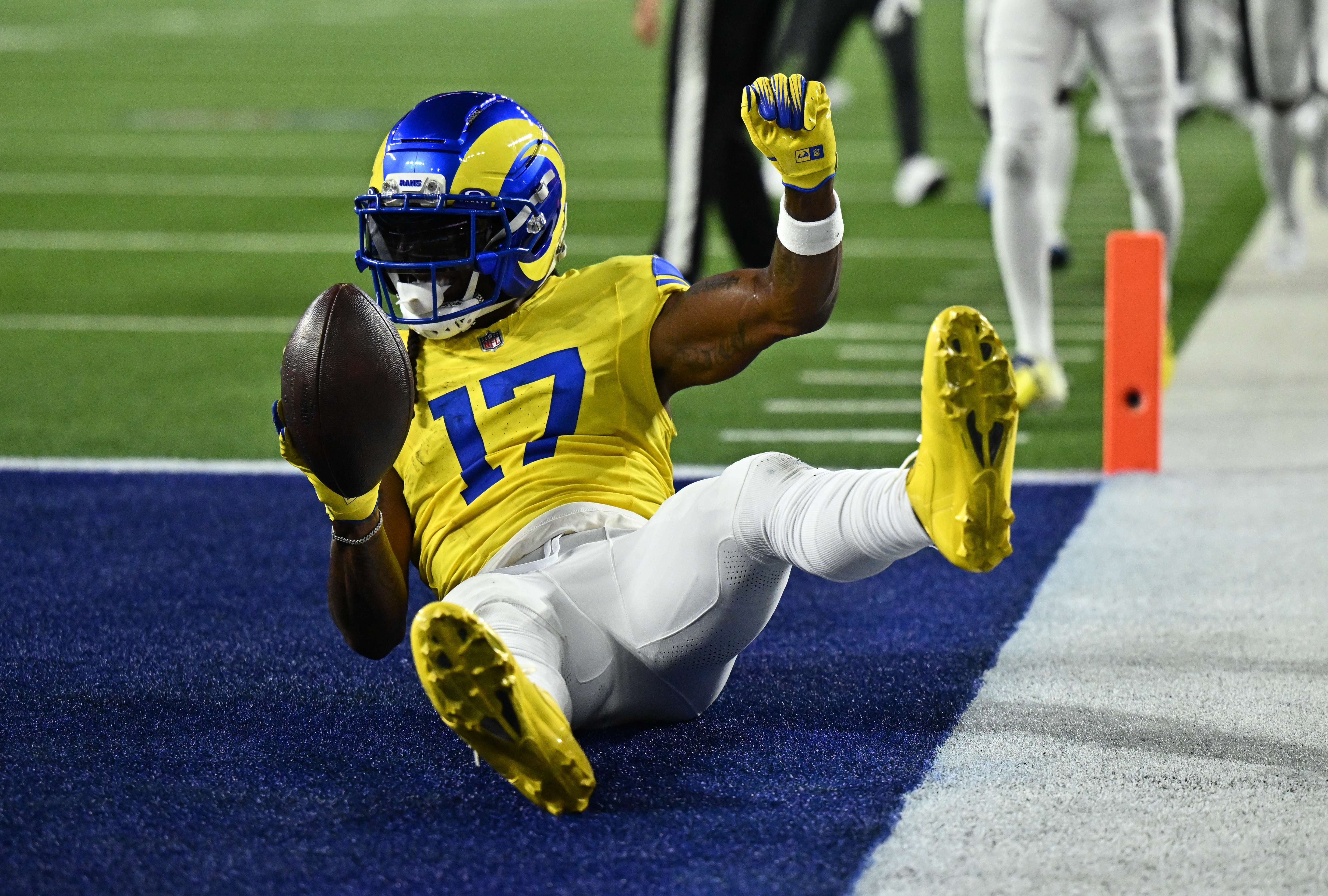 Los Angeles Rams wide receiver Davante Adams (17) scores a touchdown as he is featured in our Rams vs. Broncos touchdown scorer.
