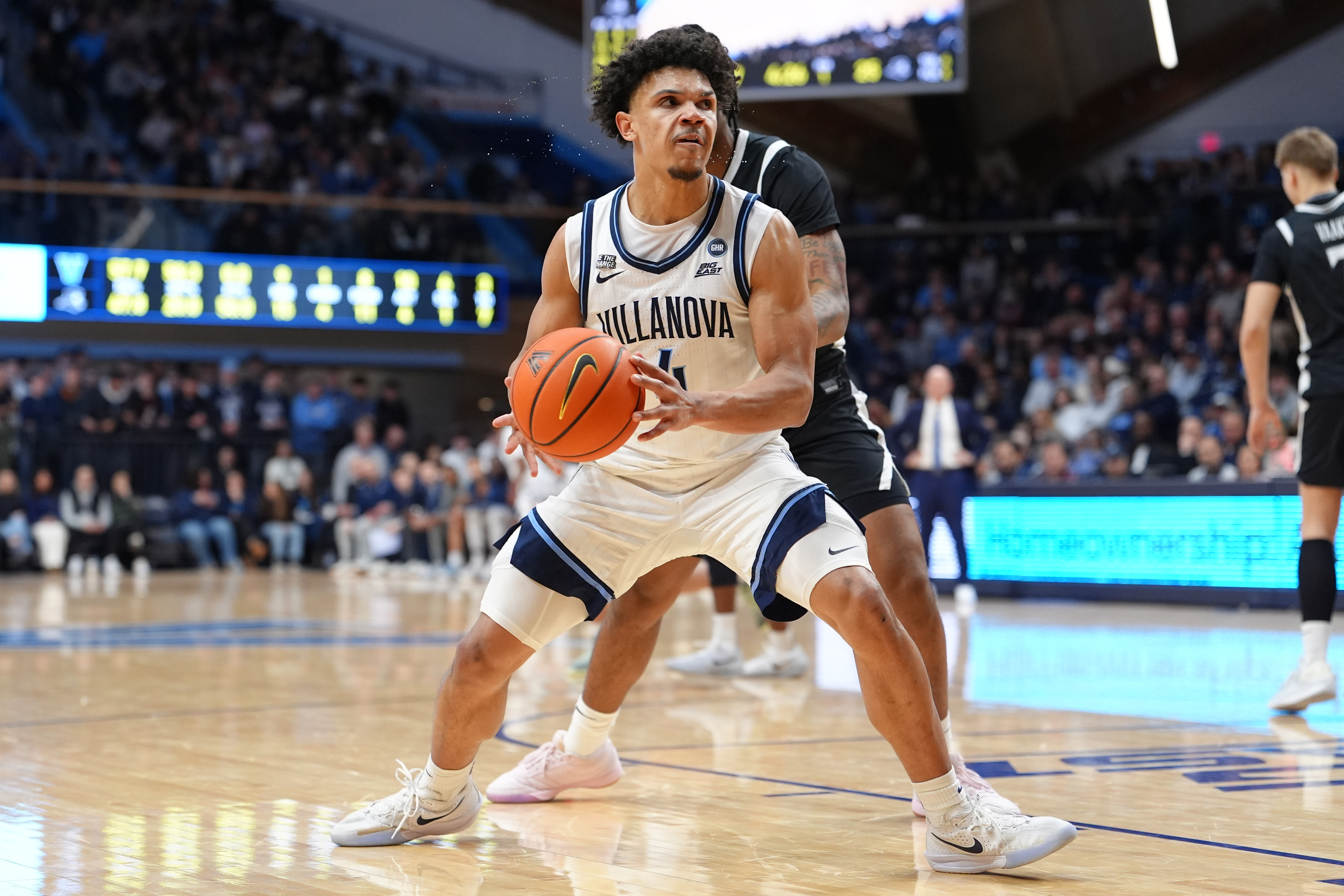 Villanova Wildcats guard Tyler Perkins (4) drives with the ball as we break down our Villanova vs. Georgetown prediction, picks & odds.