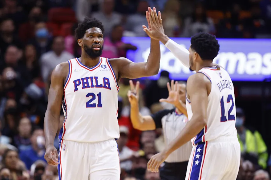 Joel Embiid and Tobias Harris of the Philadelphia 76ers celebrate against the Miami Heat during the second half at FTX Arena in Miami, Florida. Photo by Michael Reaves/Getty Images via AFP.