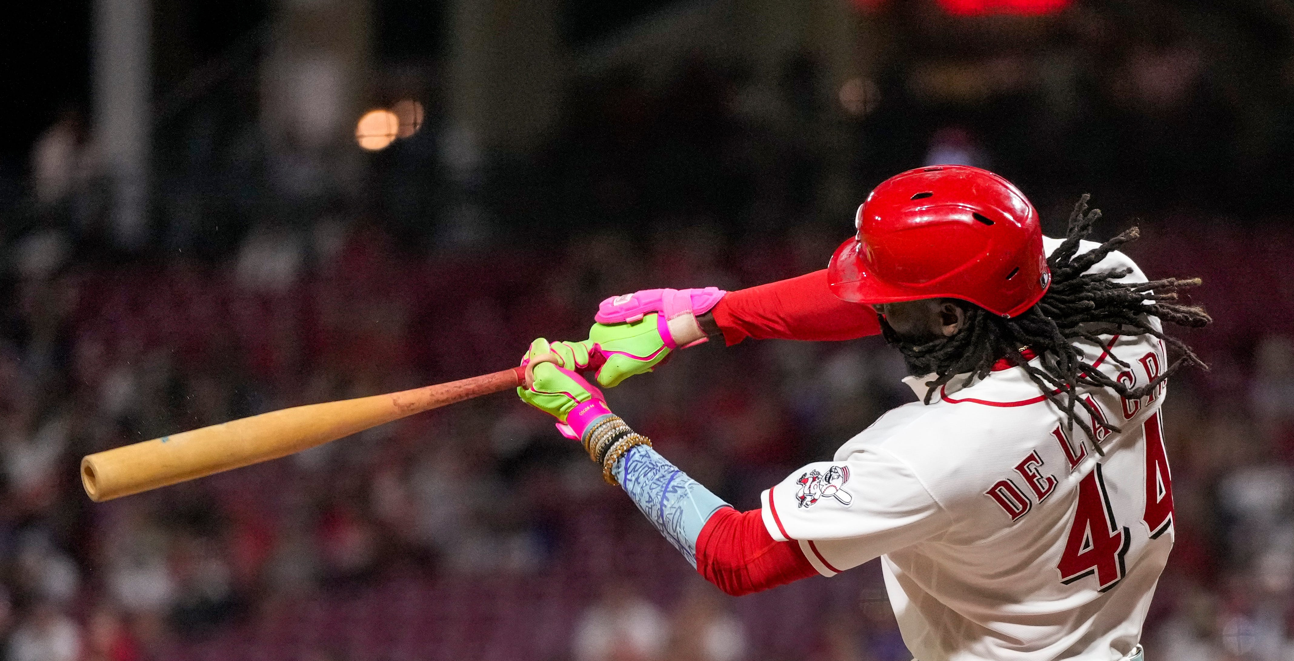 Elly De La Cruz swings at a pitch as we make our best Reds vs. Blue Jays prediction