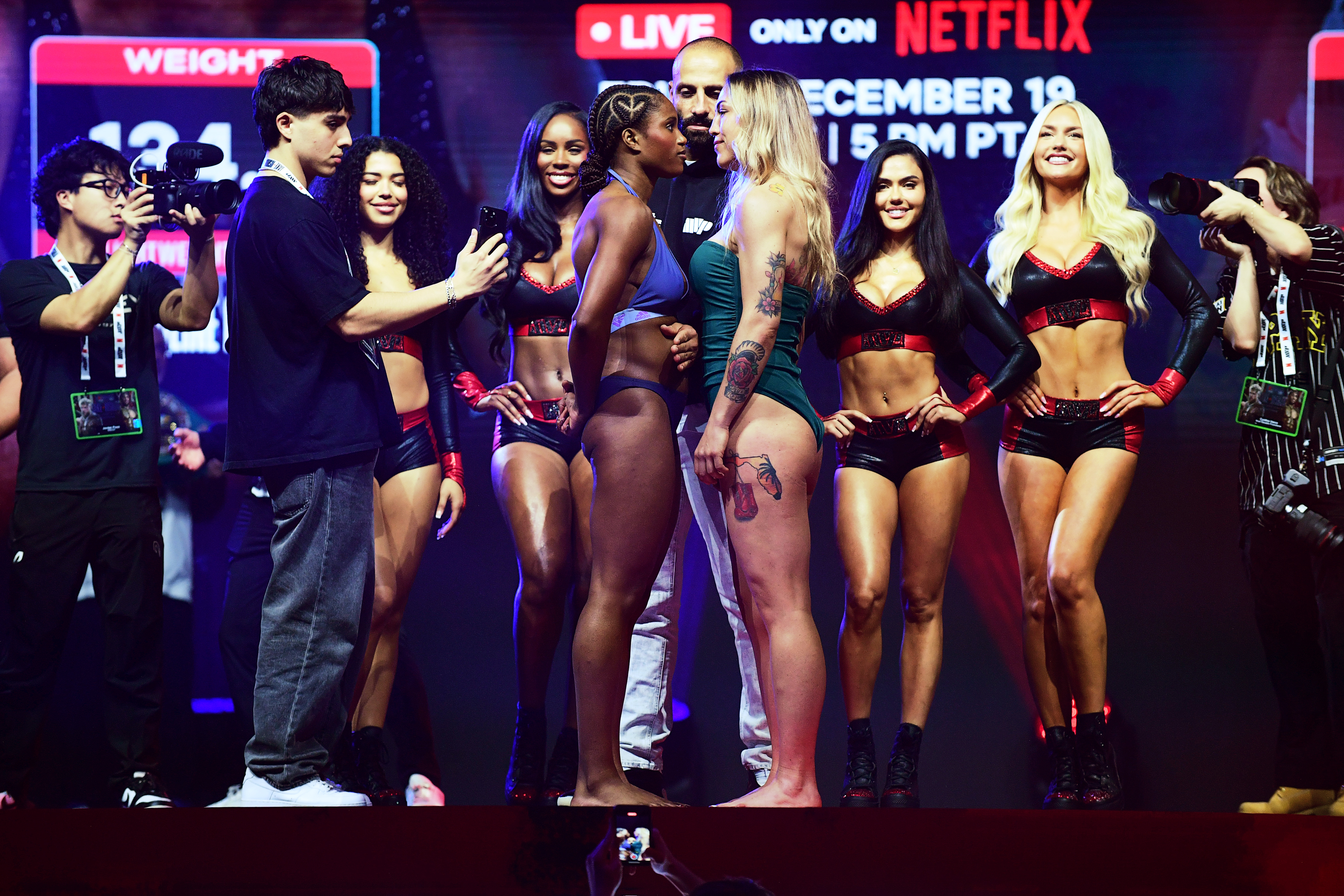 Caroline Dubois and Camila Panatta stare each other down on stage during the official weigh-in as we make our Caroline Dubois vs. Camilla Panatta predictions