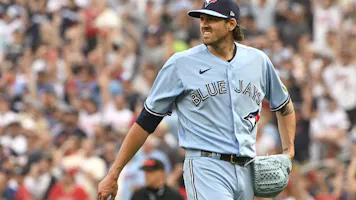 Kevin Gausman #34 of the Toronto Blue Jays reacts as we look at the latest AL Cy Young odds and NL Cy Young odds ahead of the 2024 MLB season.