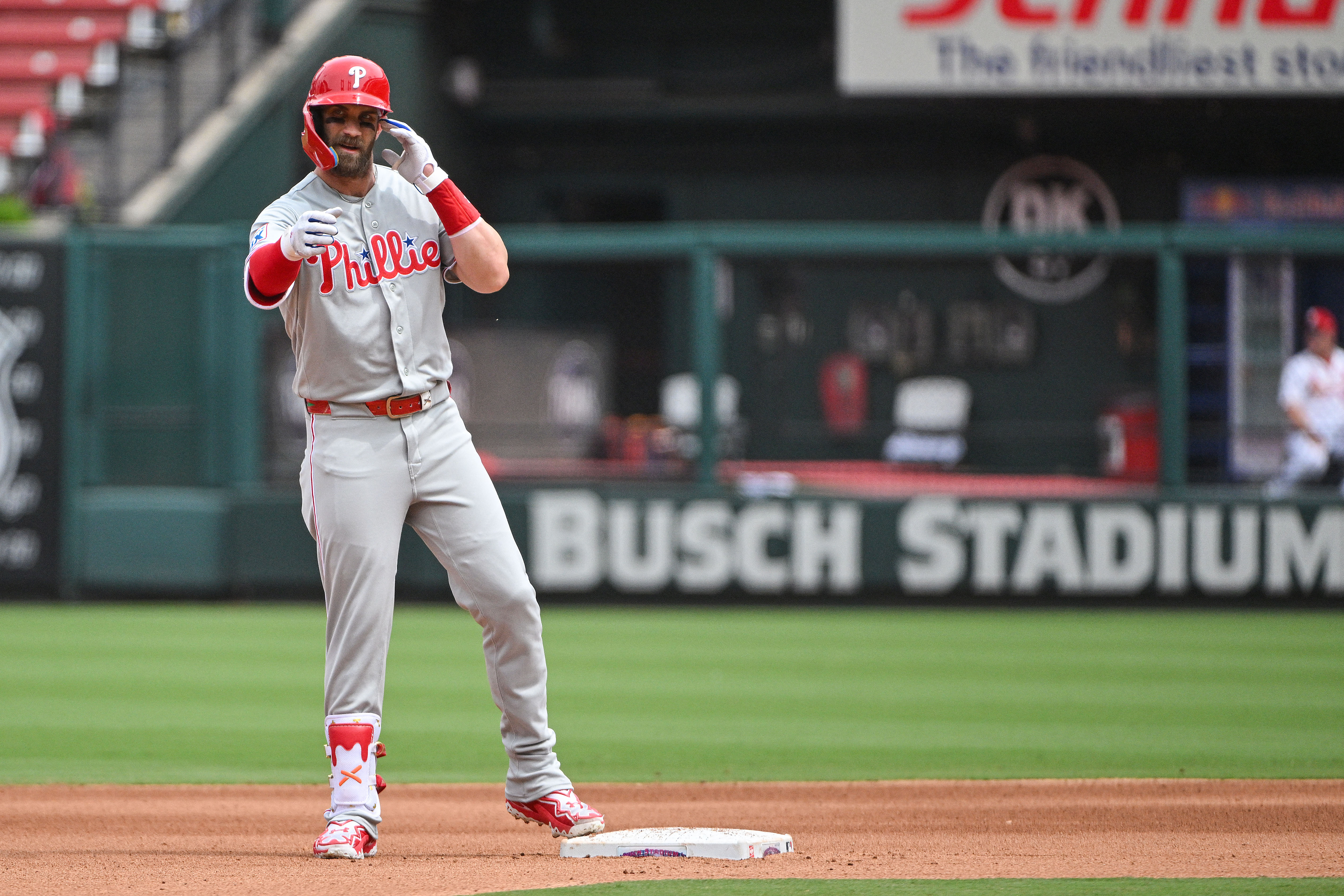 Philadelphia Phillies right fielder Bryce Harper reacts as we look at lawmakers pushing MLB to change rules surrounding players and sports betting promotions